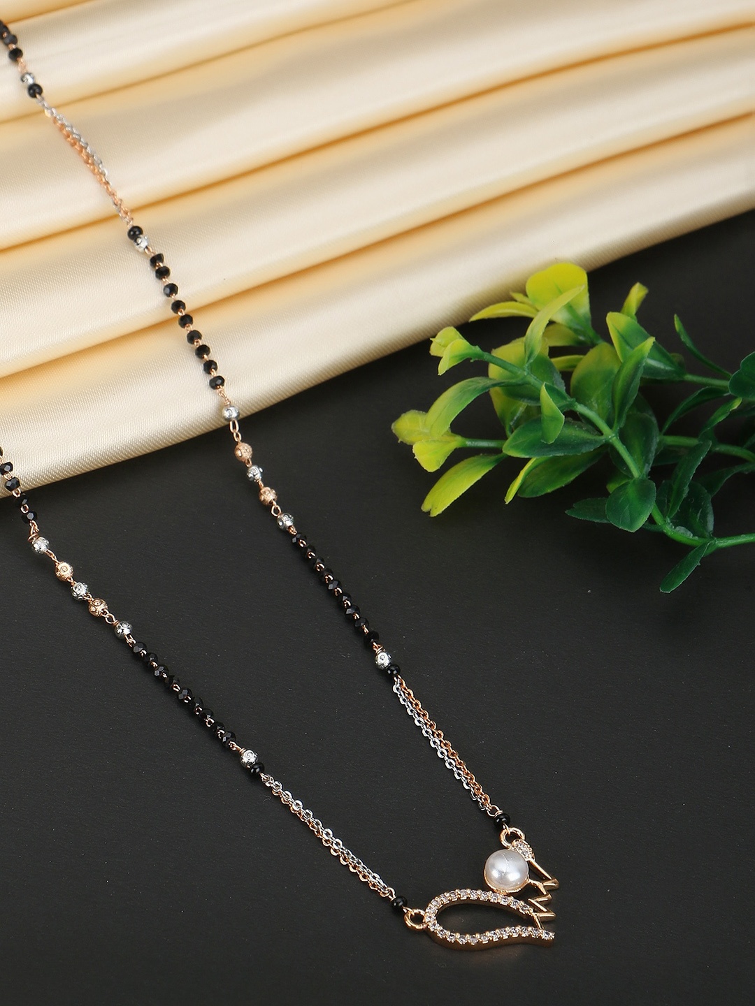 

Adwitiya Collection Gold-Plated Stone-studded Heart Shaped Charm Mangalsutra