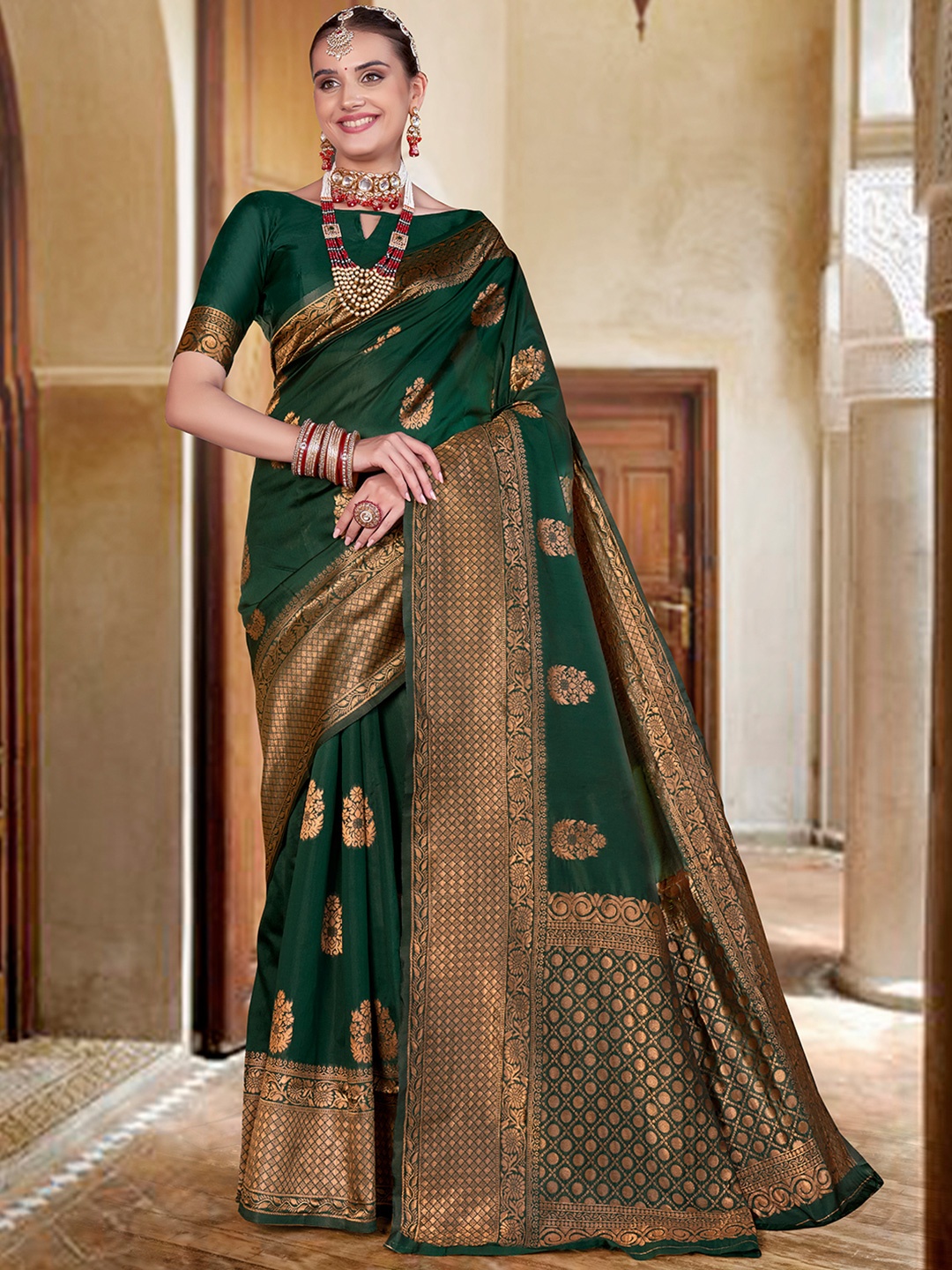 

Anouk Rustic Green & Gold-Toned Ethnic Motifs Woven Design Zari Banarasi Saree