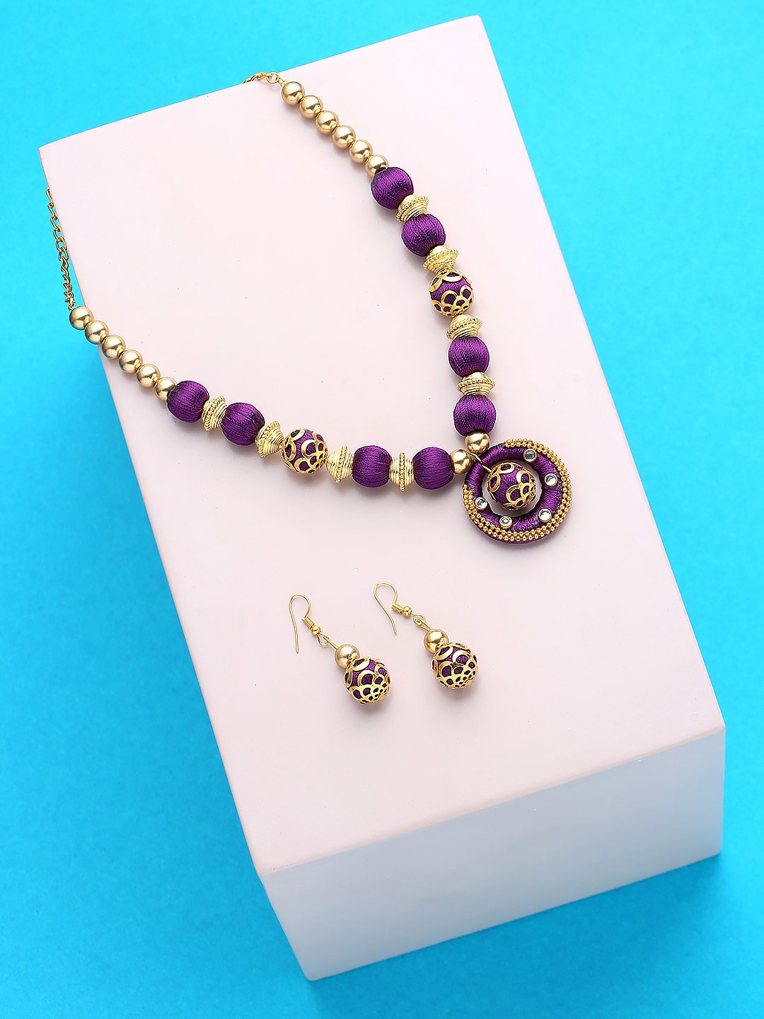 

AKSHARA Gold Plated German Silver Stones Studded & Pearls Beaded Jewellery Set