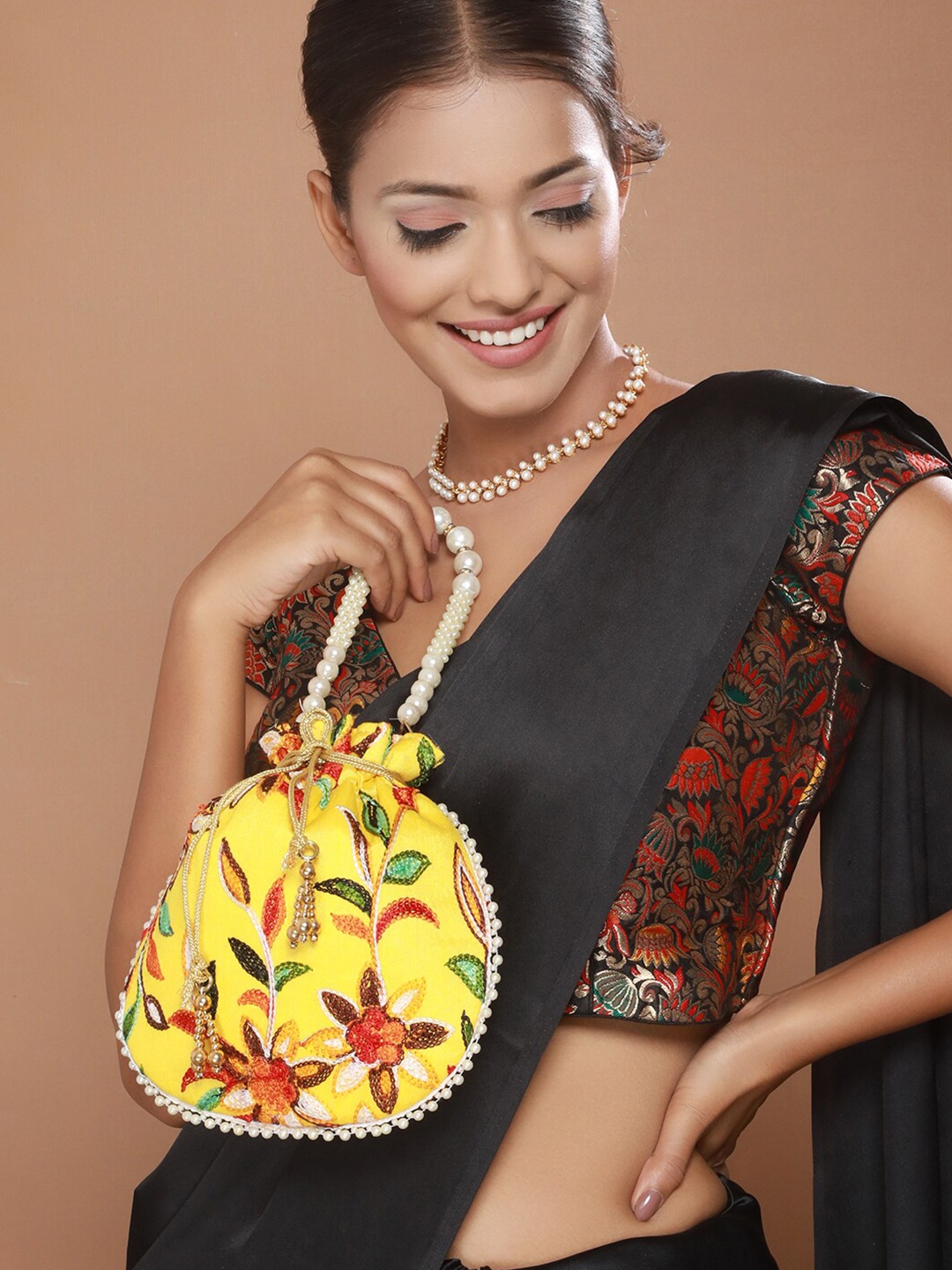 

Anouk Embroidered Potli Clutch, Yellow