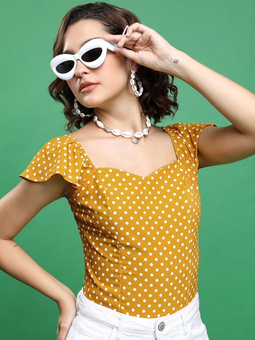 

Tokyo Talkies Mustard Yellow & White Polka Dots Printed Flutter Sleeves Top