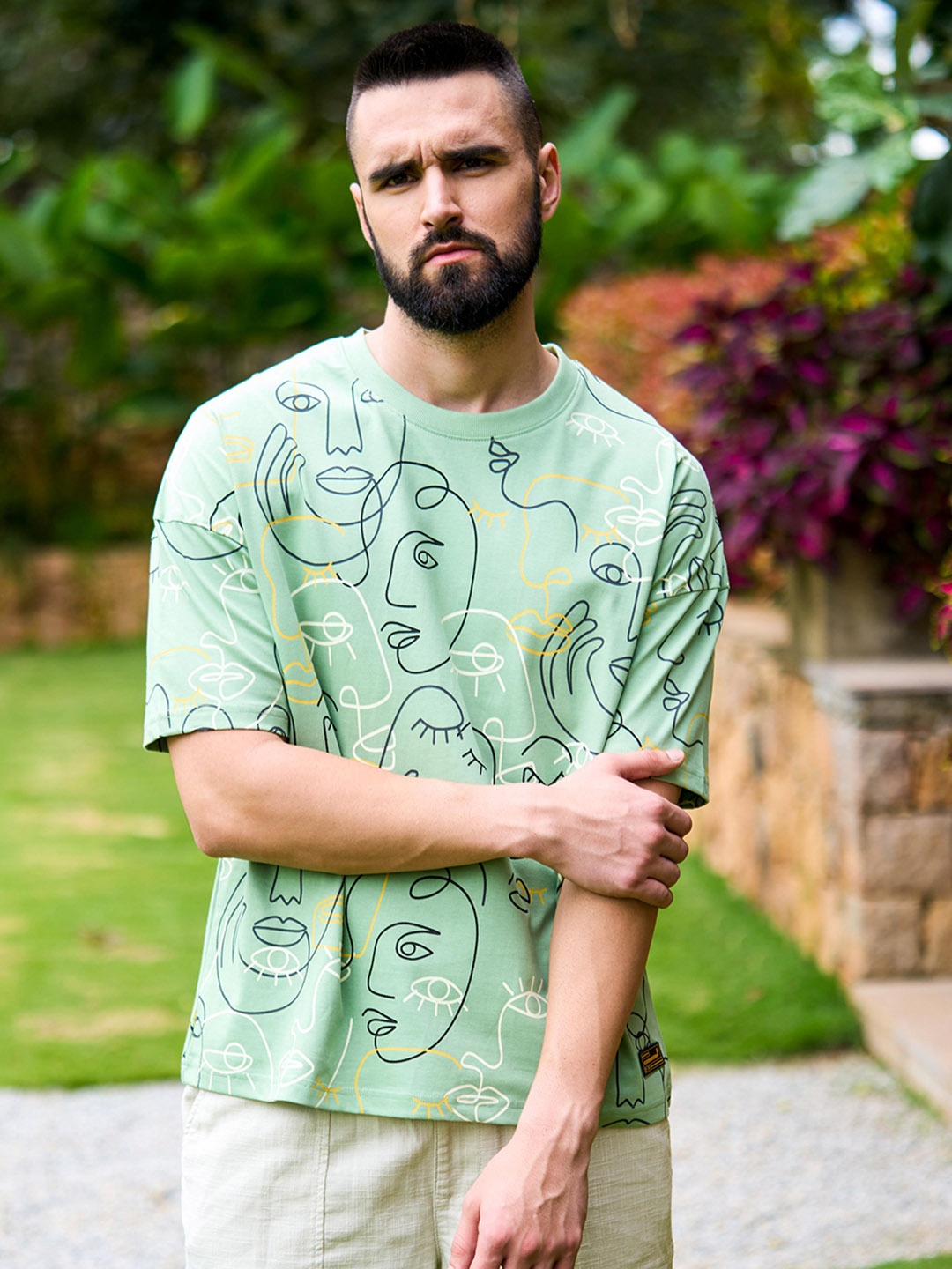 

Stormborn Conversational Printed Drop Shoulder Sleeves Pure Cotton Oversized T-shirt, Green