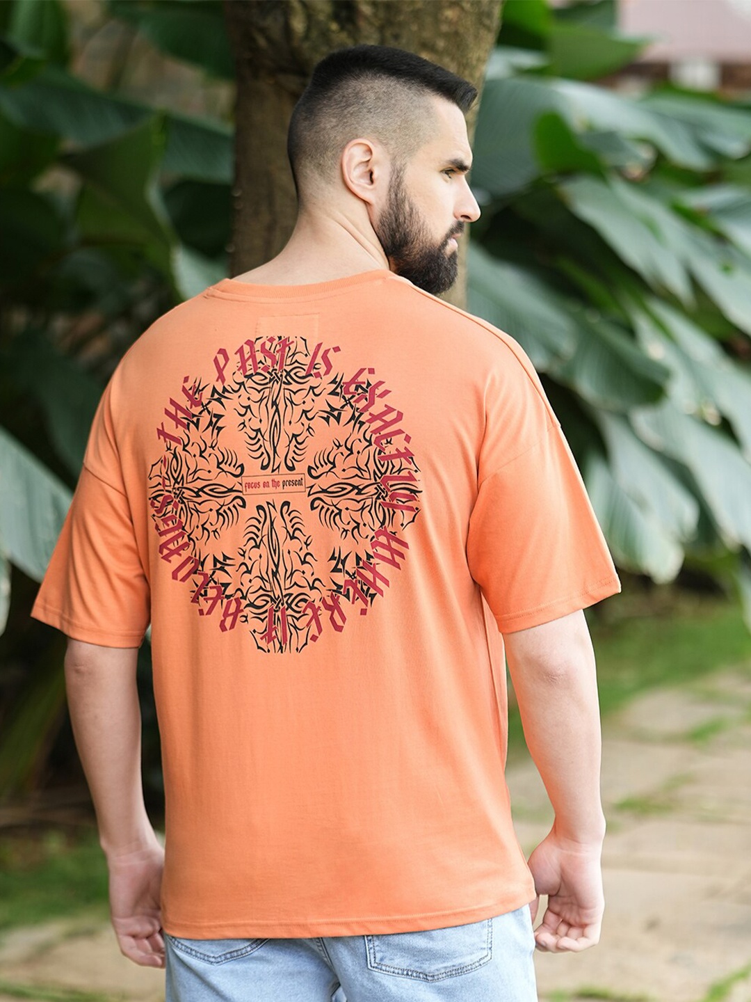 

Stormborn Graphic Printed Oversized Drop-Shoulder Cotton T-shirt, Peach