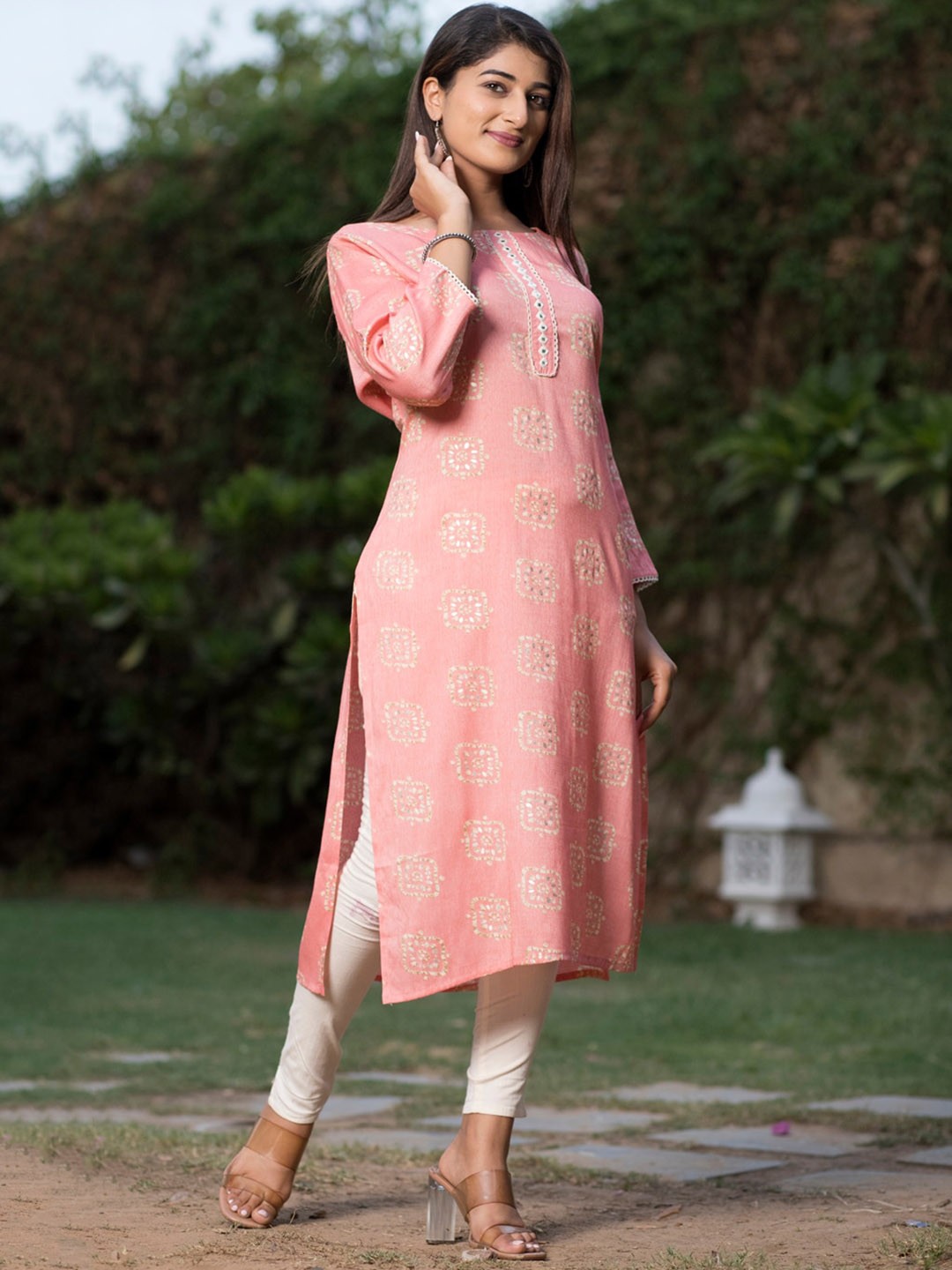 

Sangria Pink & Off-White Ethnic Motif Printed Mirror Work Straight Kurtas