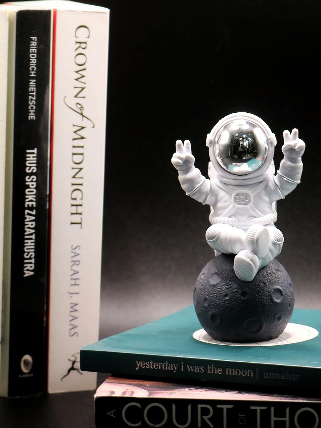 

Street27 White & Silver-Toned Textured Sitting On The Moon Astronaut Figurine Showpiece