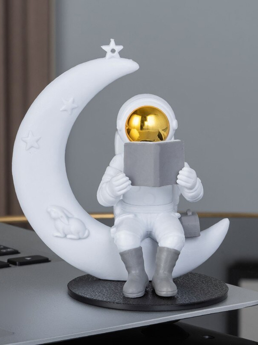 

Street27 White & Gold-Toned Textured Reading On The Moon Astronaut Figurine Showpiece