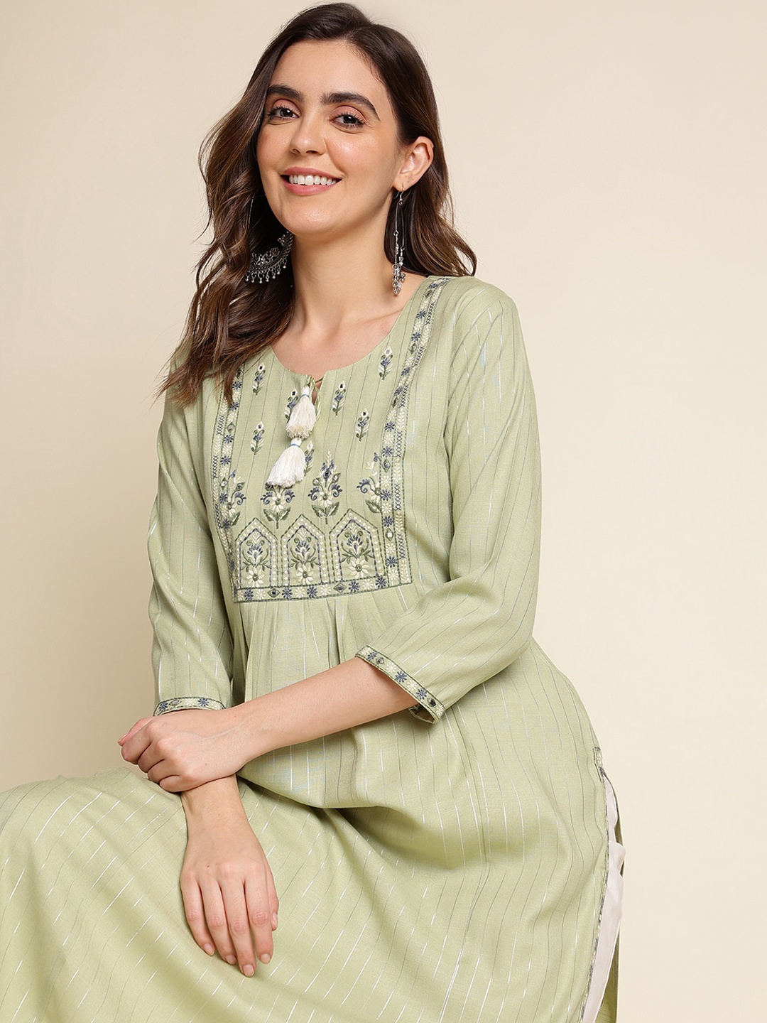 

Sangria Striped Tie-Up Neck Thread Work Kurta With Trouser, Green