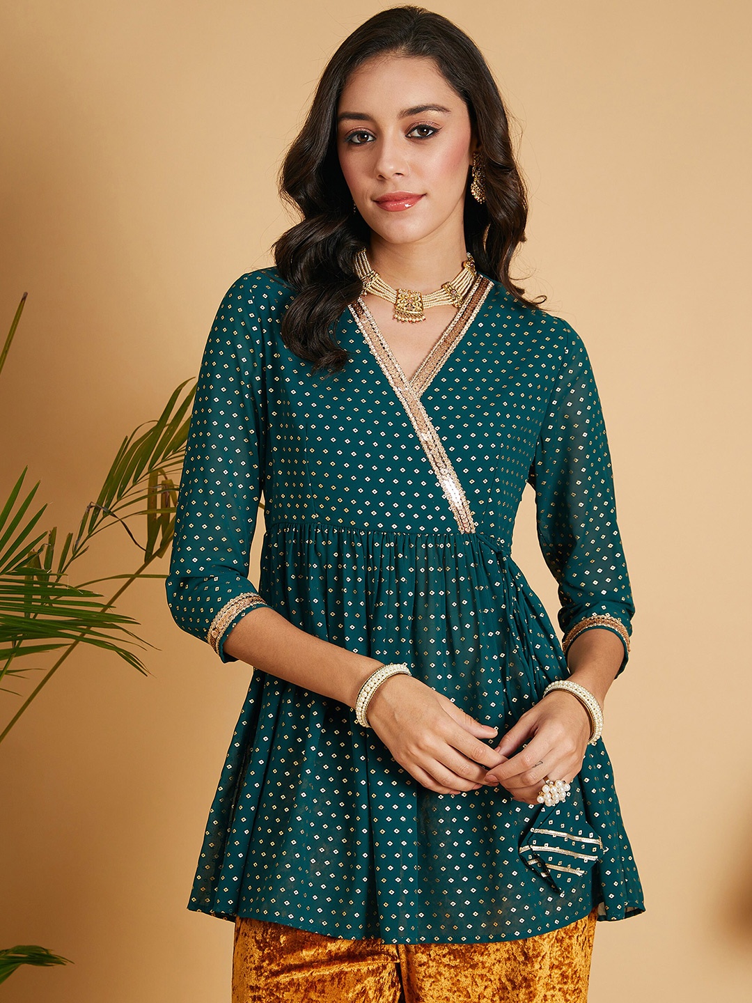 

Shae by SASSAFRAS Green Geometric Printed V-Neck Georgette A-Line Kurti