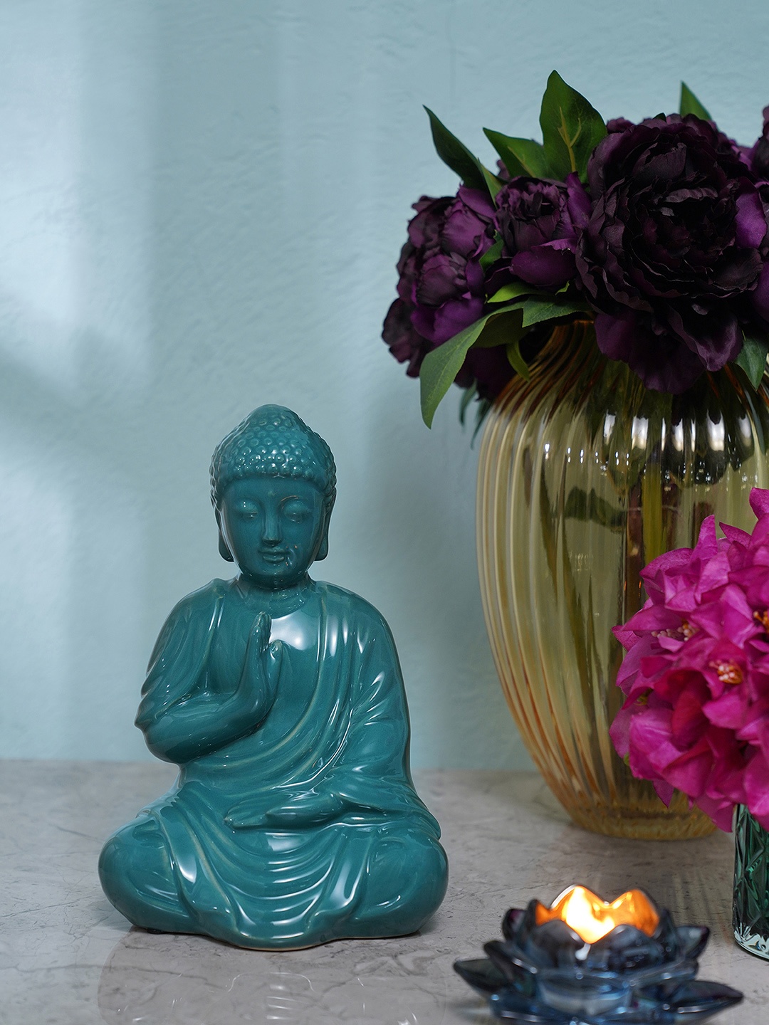 

Pure Home and Living Teal Blue Textured Ceramic Sitting Buddha Showpiece