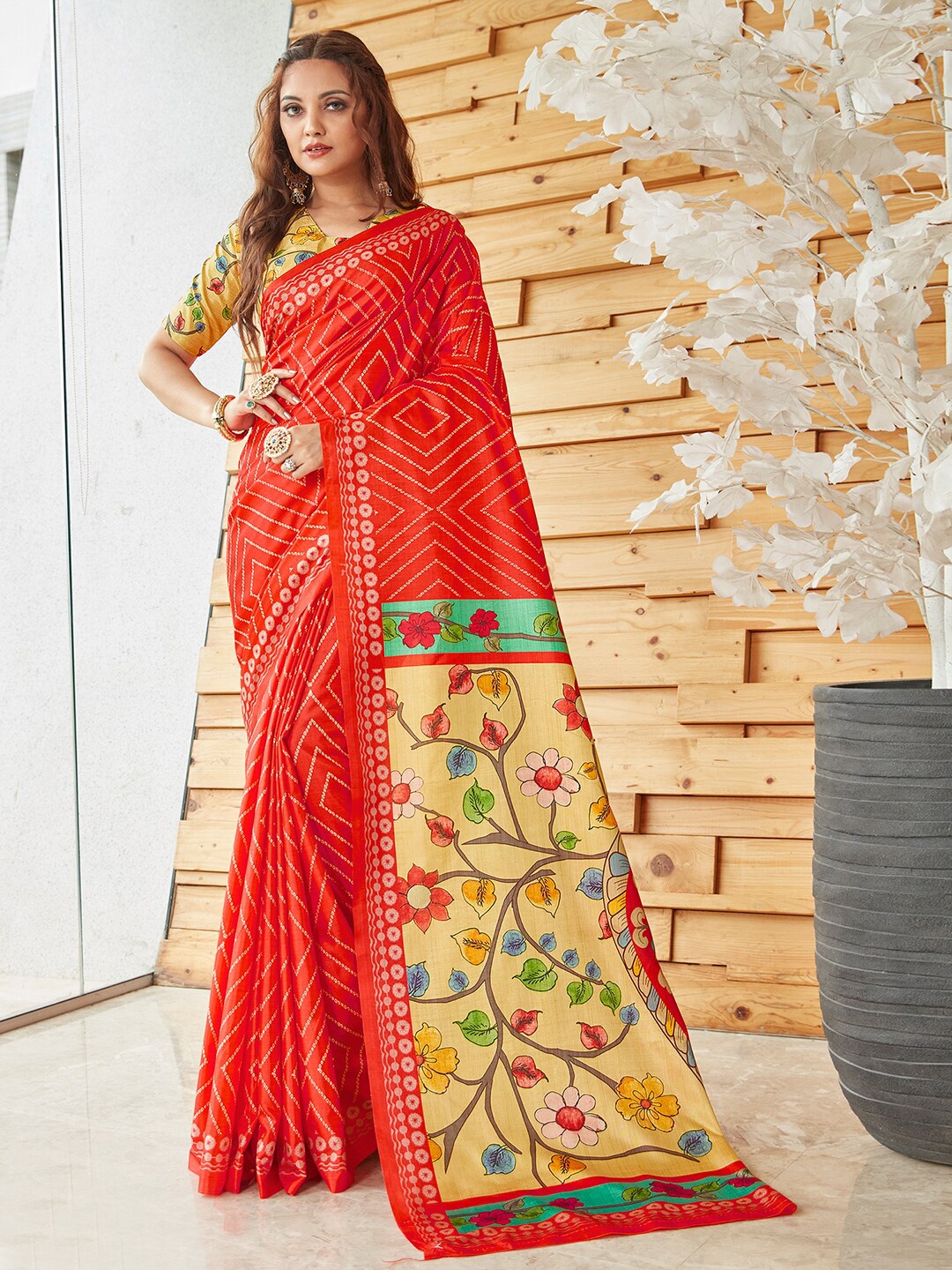 

Anouk Orange Ethnic Motifs Printed Saree