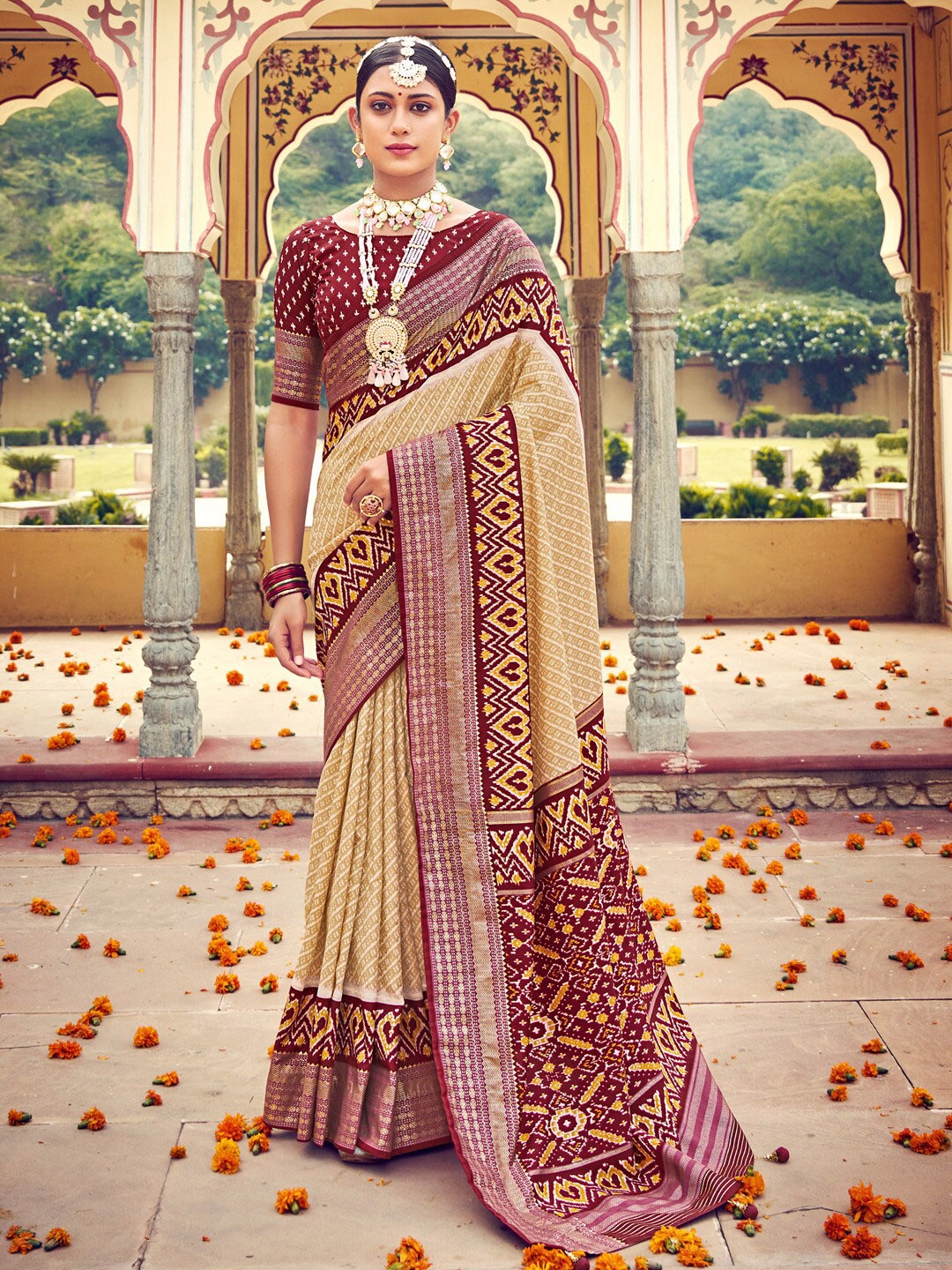 

Anouk Cream-Coloured & Maroon Ethnic Motifs Printed Zari Ikat Saree