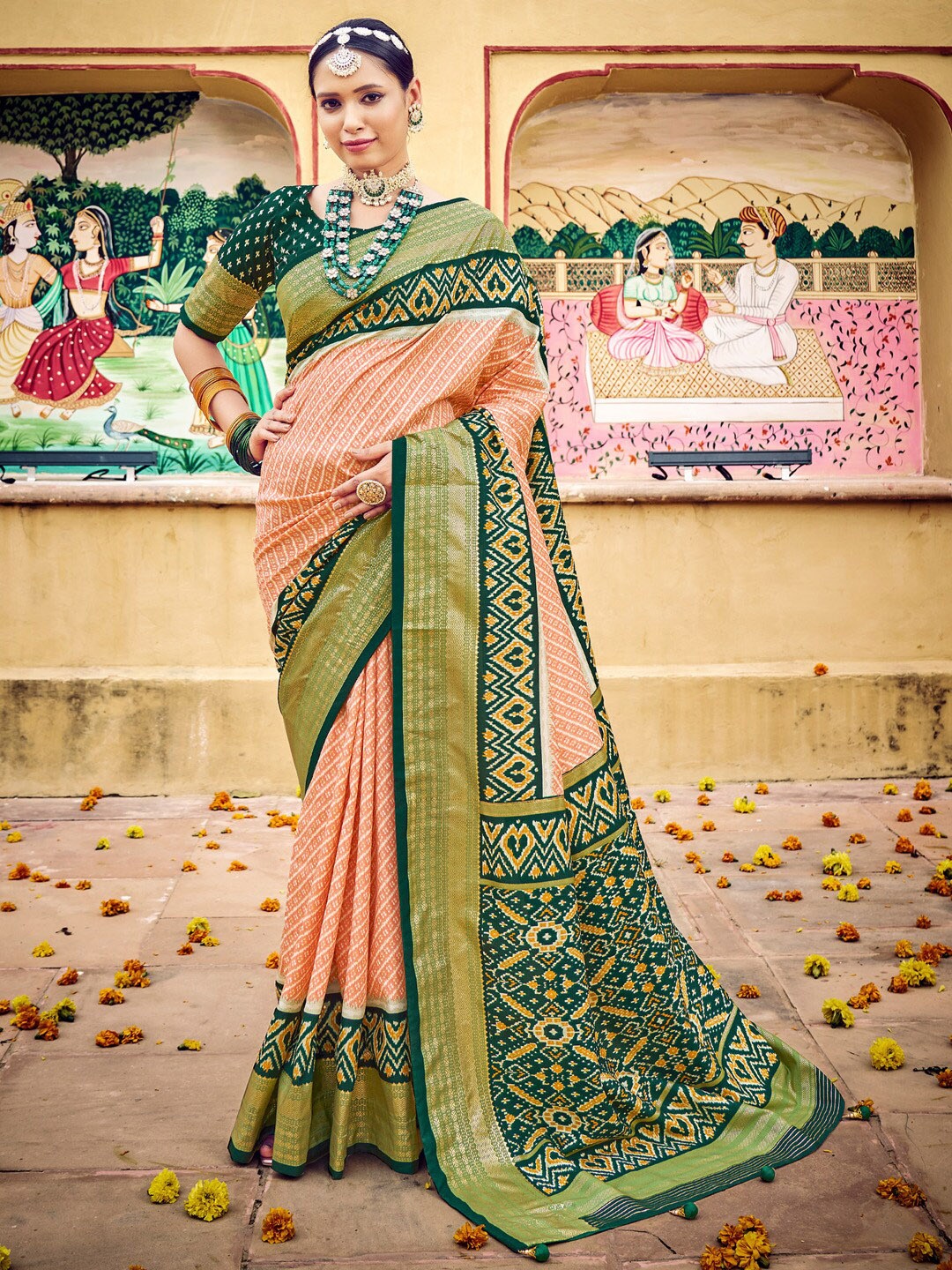 

Anouk Peach-Coloured & Green Ethnic Motifs Printed Zari Ikat Saree