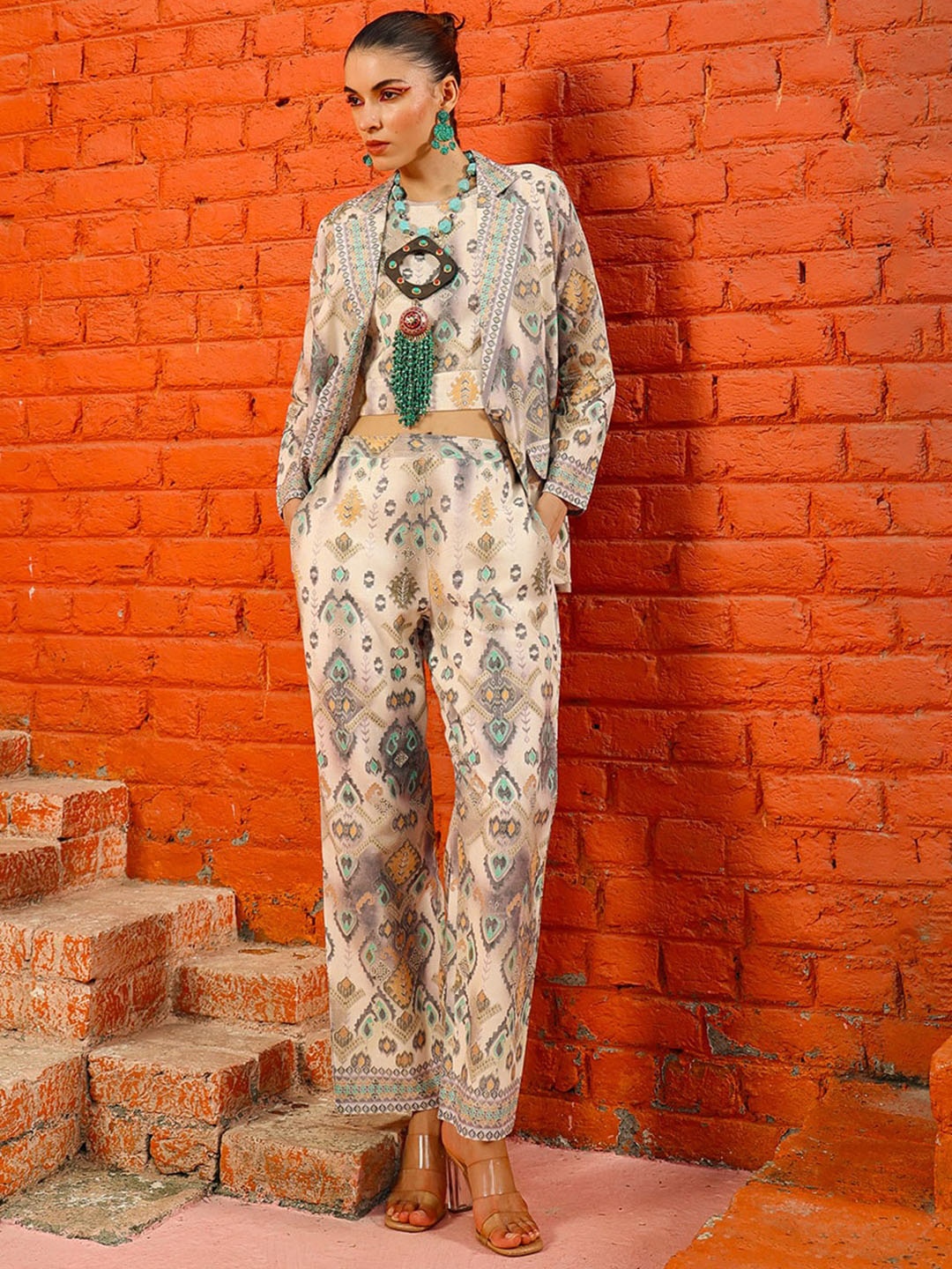 

PRATAP SONS Printed Sleeveless Crop Top With Trousers & Shawl Neck Jacket, Cream