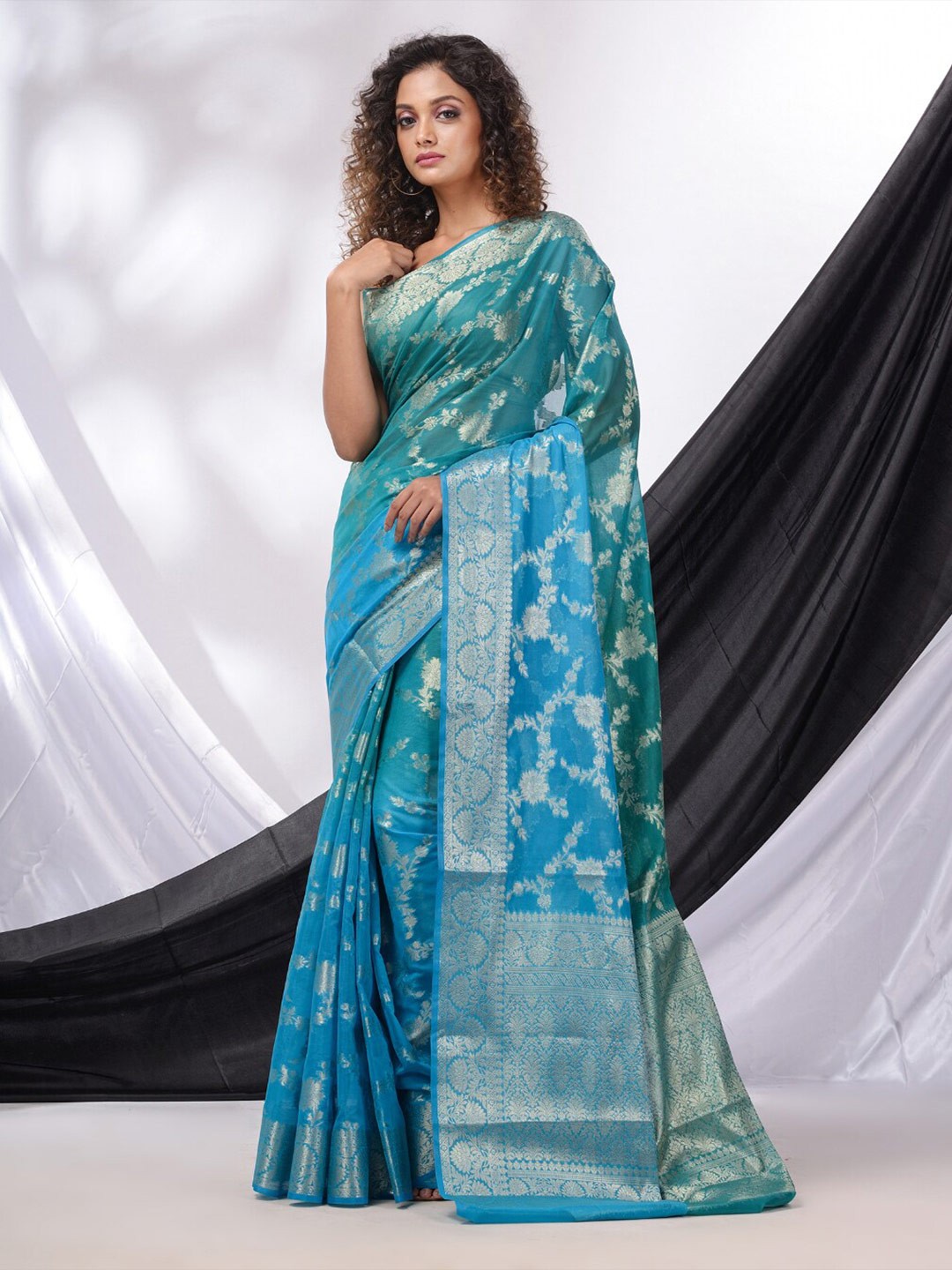 

Charukriti Woven Design Zari Pure Georgette Saree, Sea green