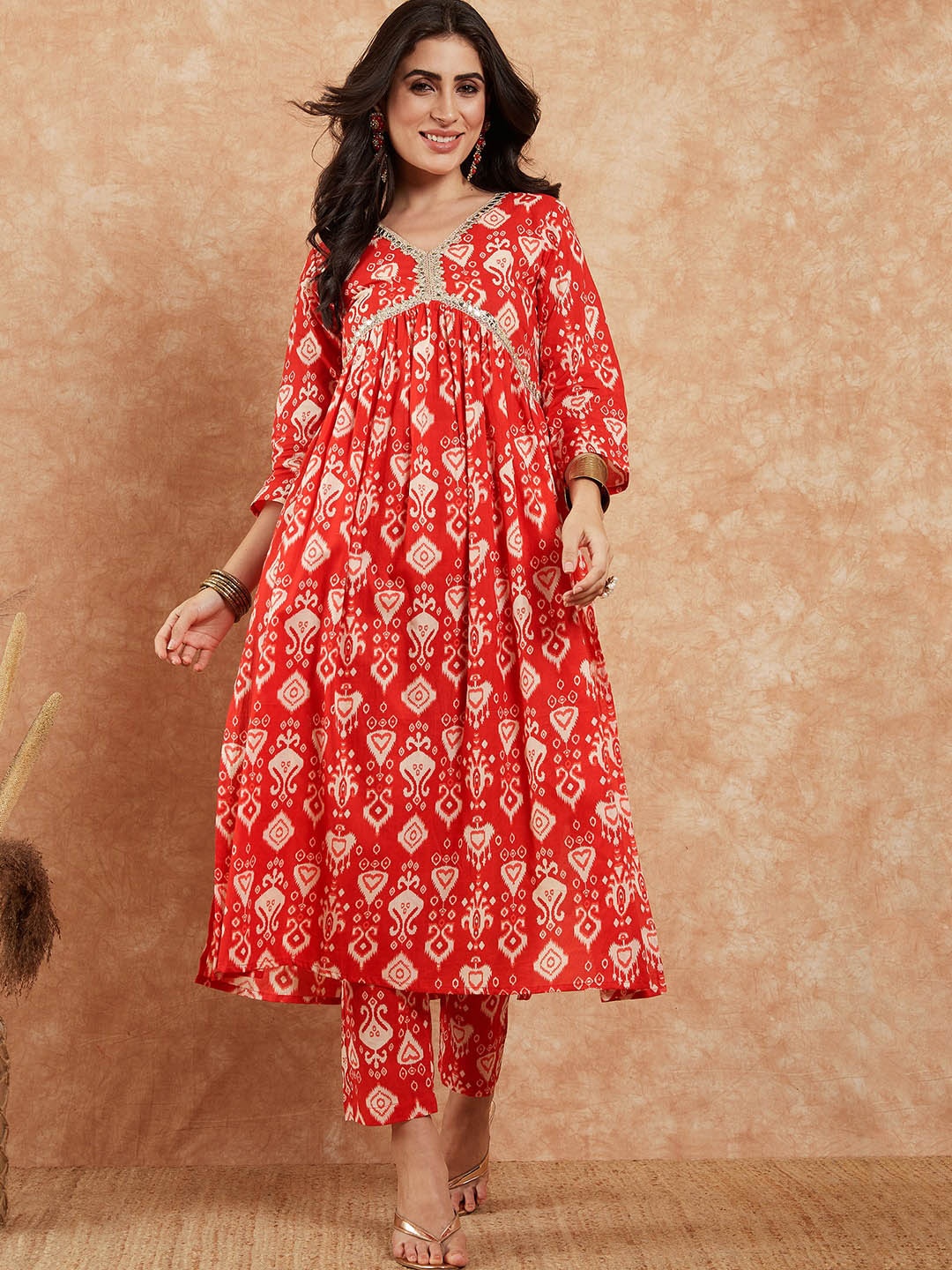 

InWeave Red Ethnic Motifs Printed Gotta Patti Empire Pure Cotton Kurta with Trousers