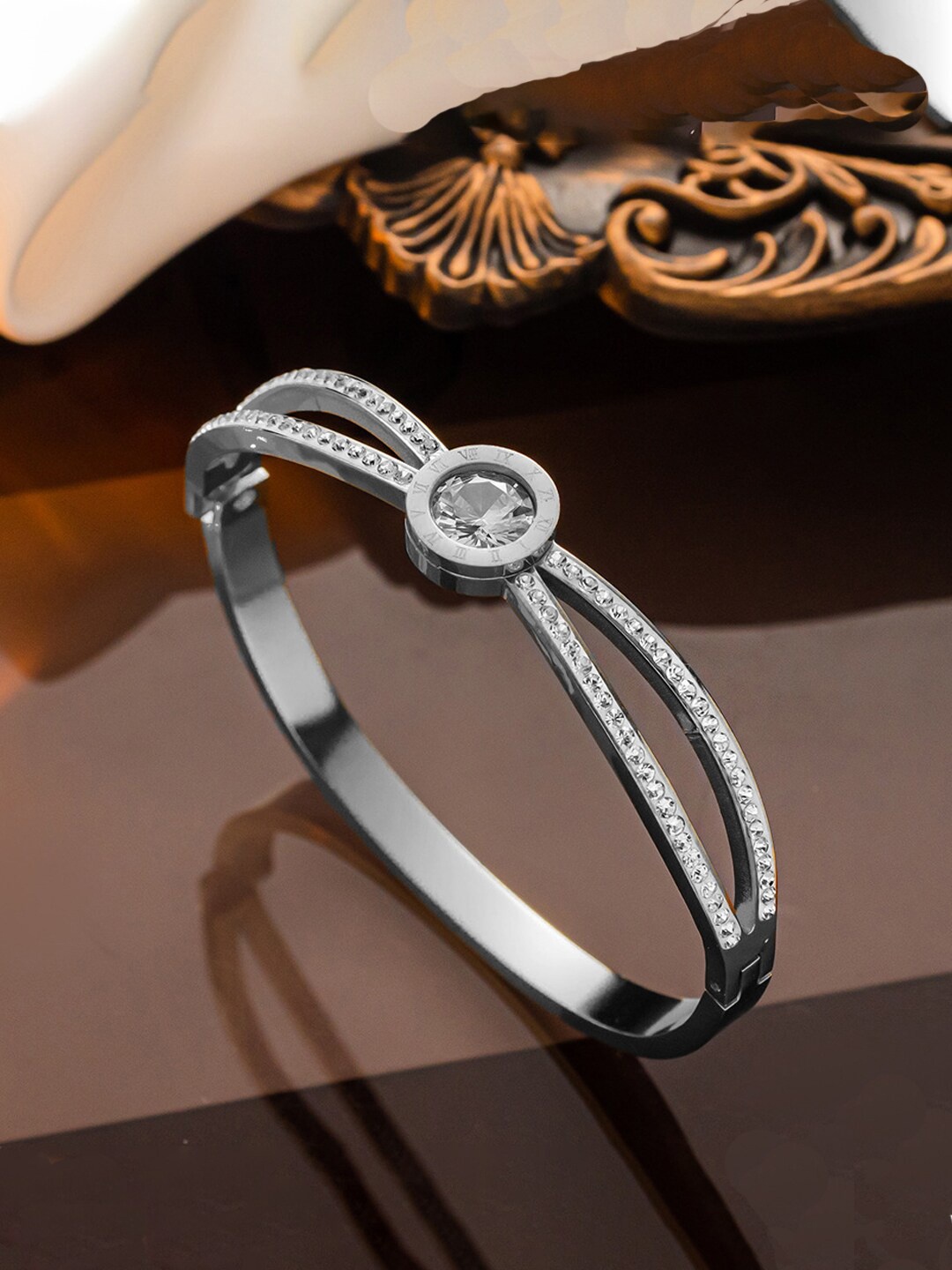 

Jewels Galaxy Stainless Steel Silver Plated American Diamond Studded Bracelet