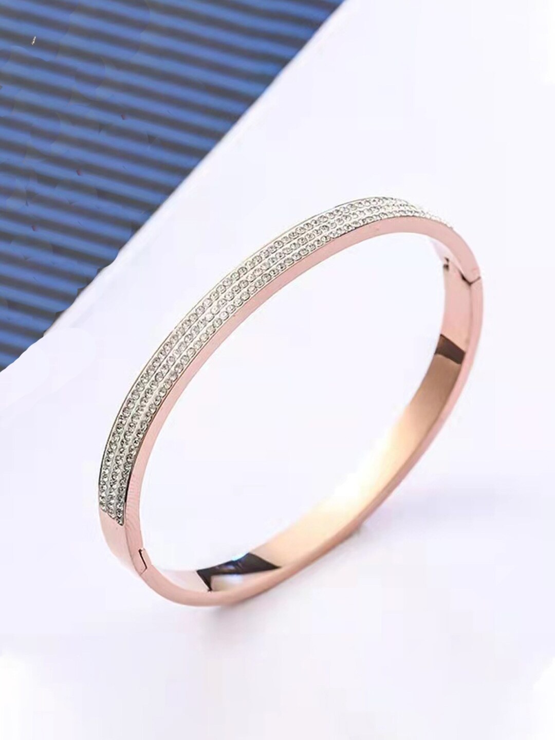

Jewels Galaxy Stainless Steel Rose Gold Plated American Diamond Studded Bracelet
