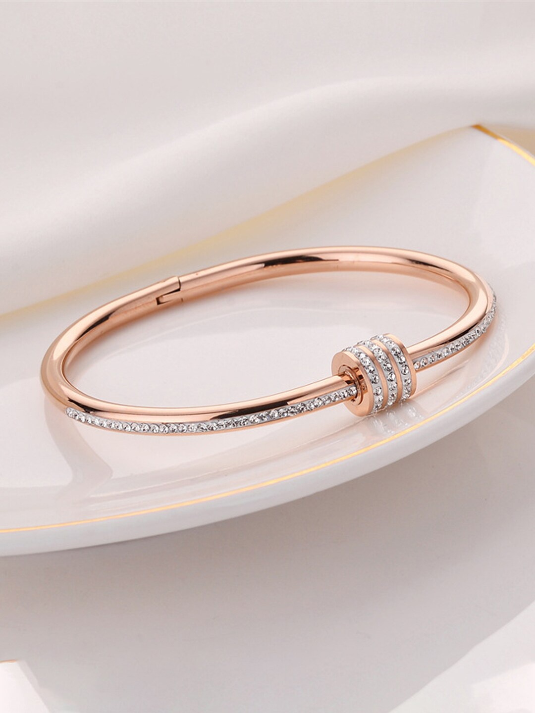 

Jewels Galaxy Rose Gold Plated American Diamond Studded Bangle Style Bracelet