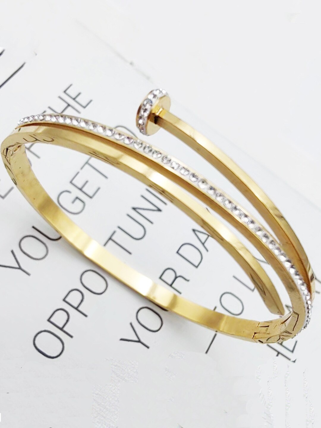 

Jewels Galaxy Gold-Plated American Diamond Cuff Bracelet