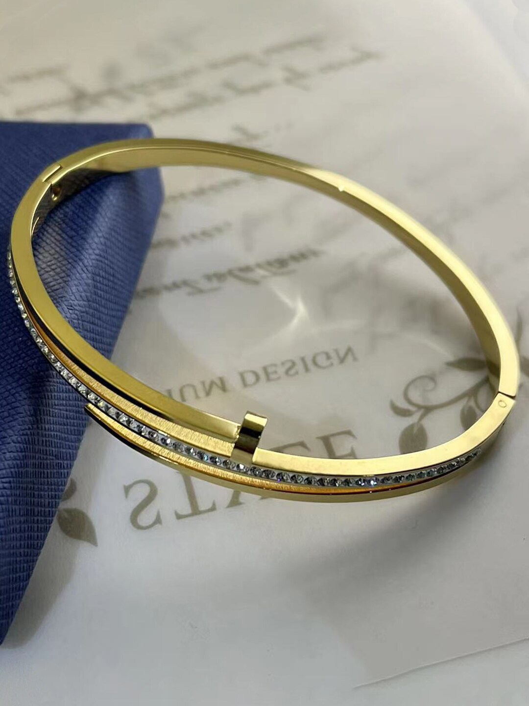 

Jewels Galaxy Gold-Plated American Diamond Cuff Bracelet