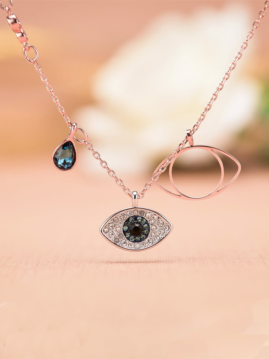 

Designs & You Rose Gold Plated American Diamond Studded Evil Eye Pendant With Chain