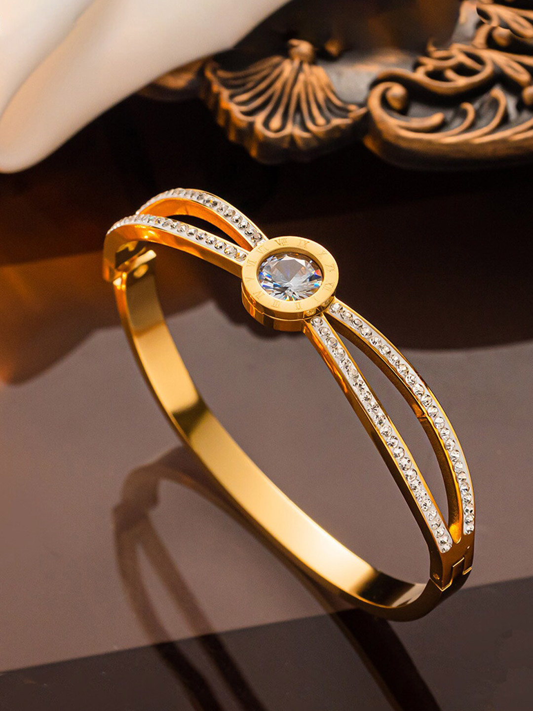 

Designs & You Women Gold Plated American Diamond Bangle-Style Bracelet