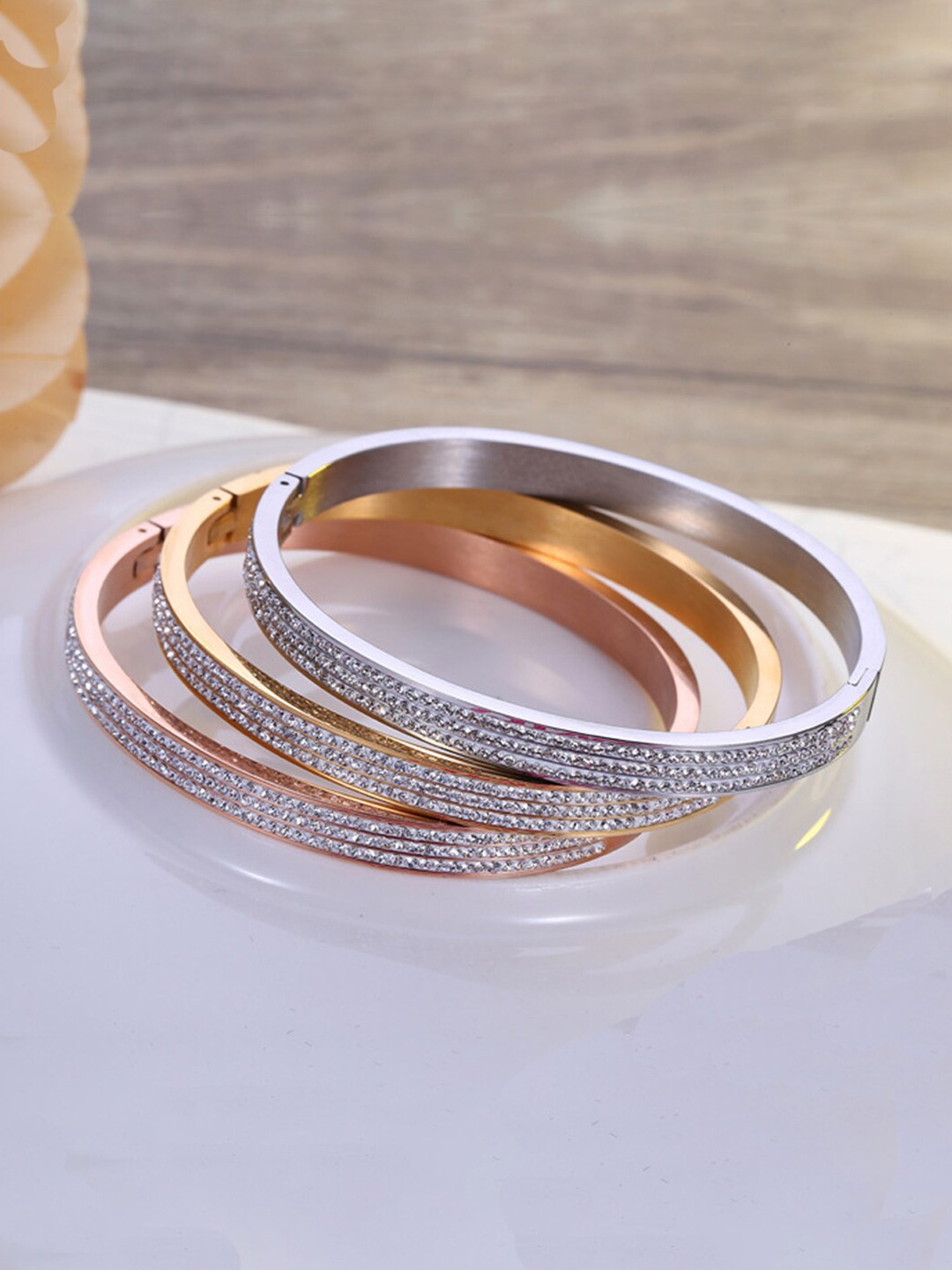 

Designs & You Set of 3 Gold Rose Gold And Silver Plated AD Studded Bangle-Style Bracelet