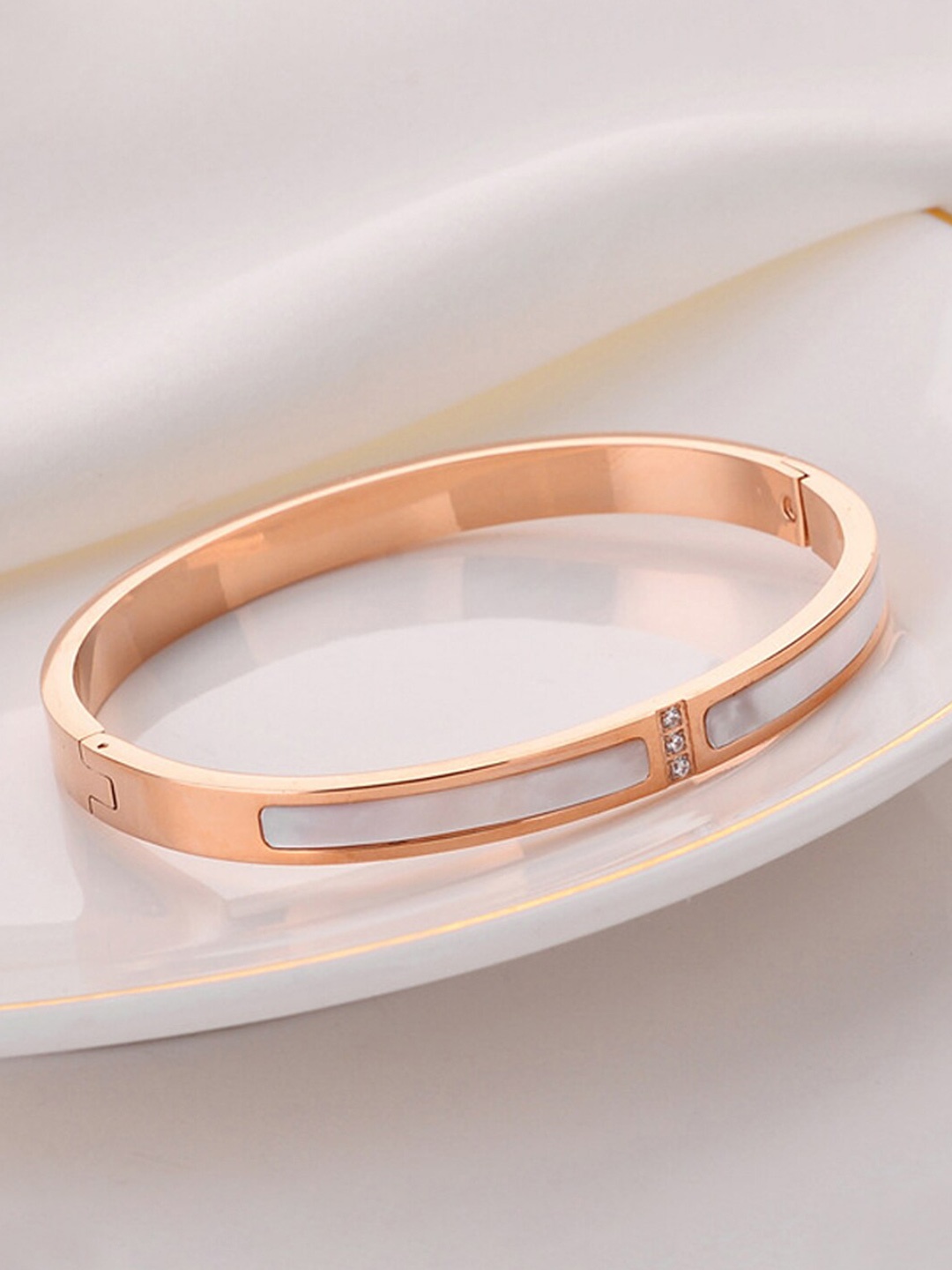 

Designs & You Rose Gold Plated Mother Of Pearls Studded Bangle-Style Bracelet