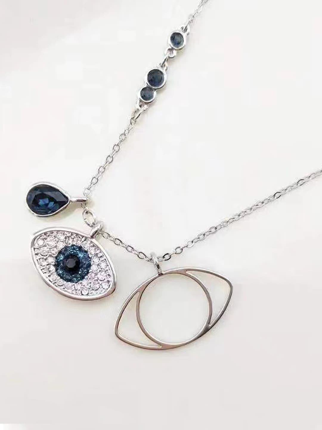 

Designs & You Silver-Plated American Diamond Studded Pendant With Chain