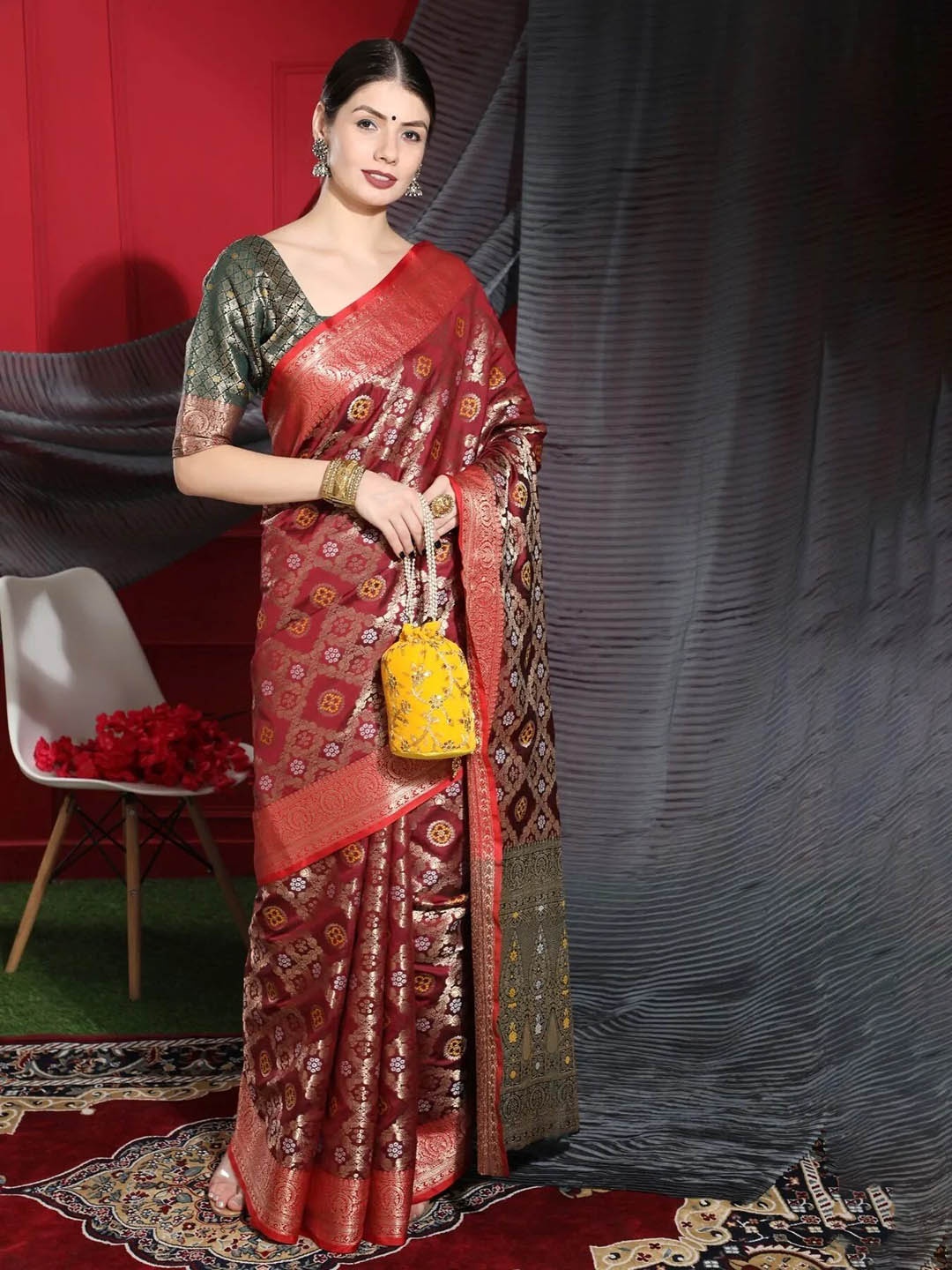 

Mitera Maroon & Green Woven Design Zari Patola Saree