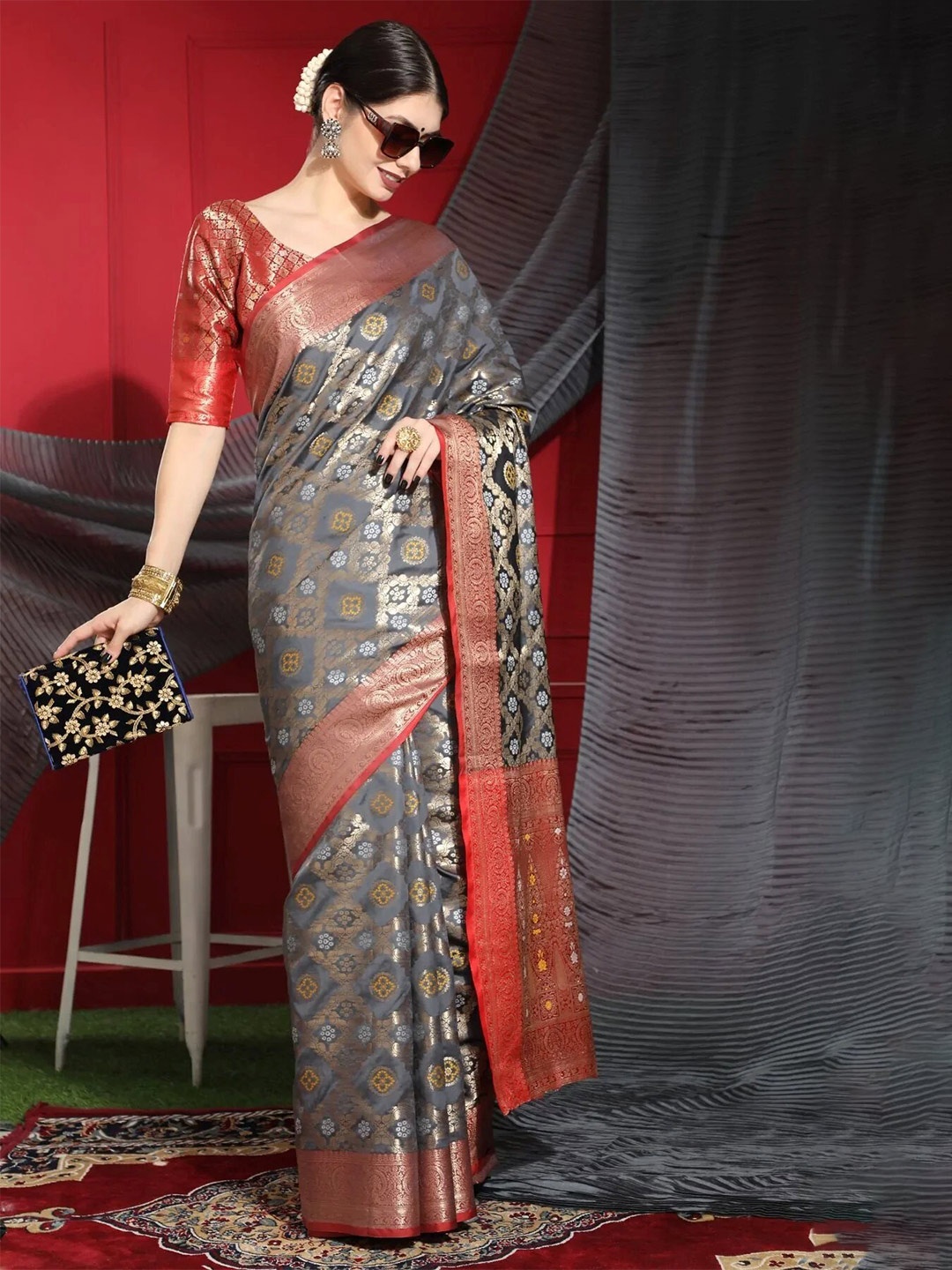 

Mitera Grey Woven Design Zari Patola Saree