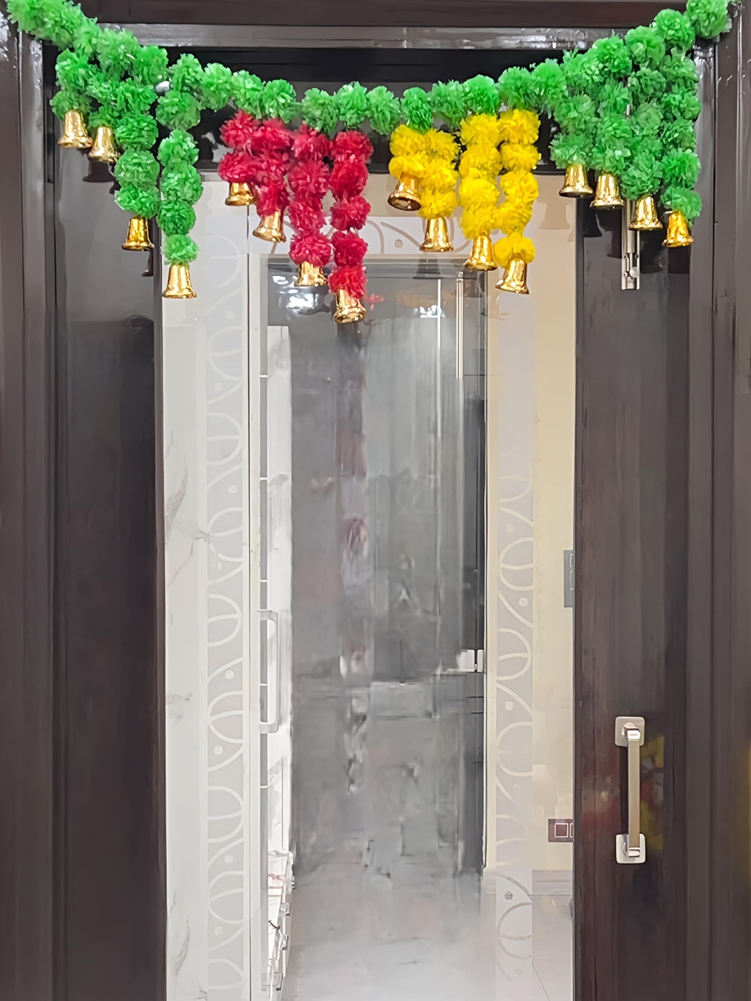 

Akaar Green & Yellow Artificial Floral Hanging Toran