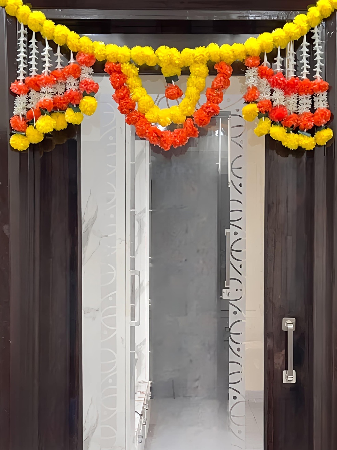 

Akaar Orange & Yellow Artificial Floral Hanging Toran