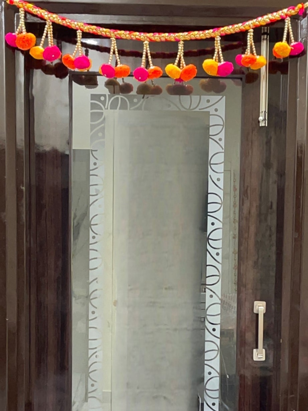 

Akaar Orange & Yellow Pom-Pom Floral Hanging Toran