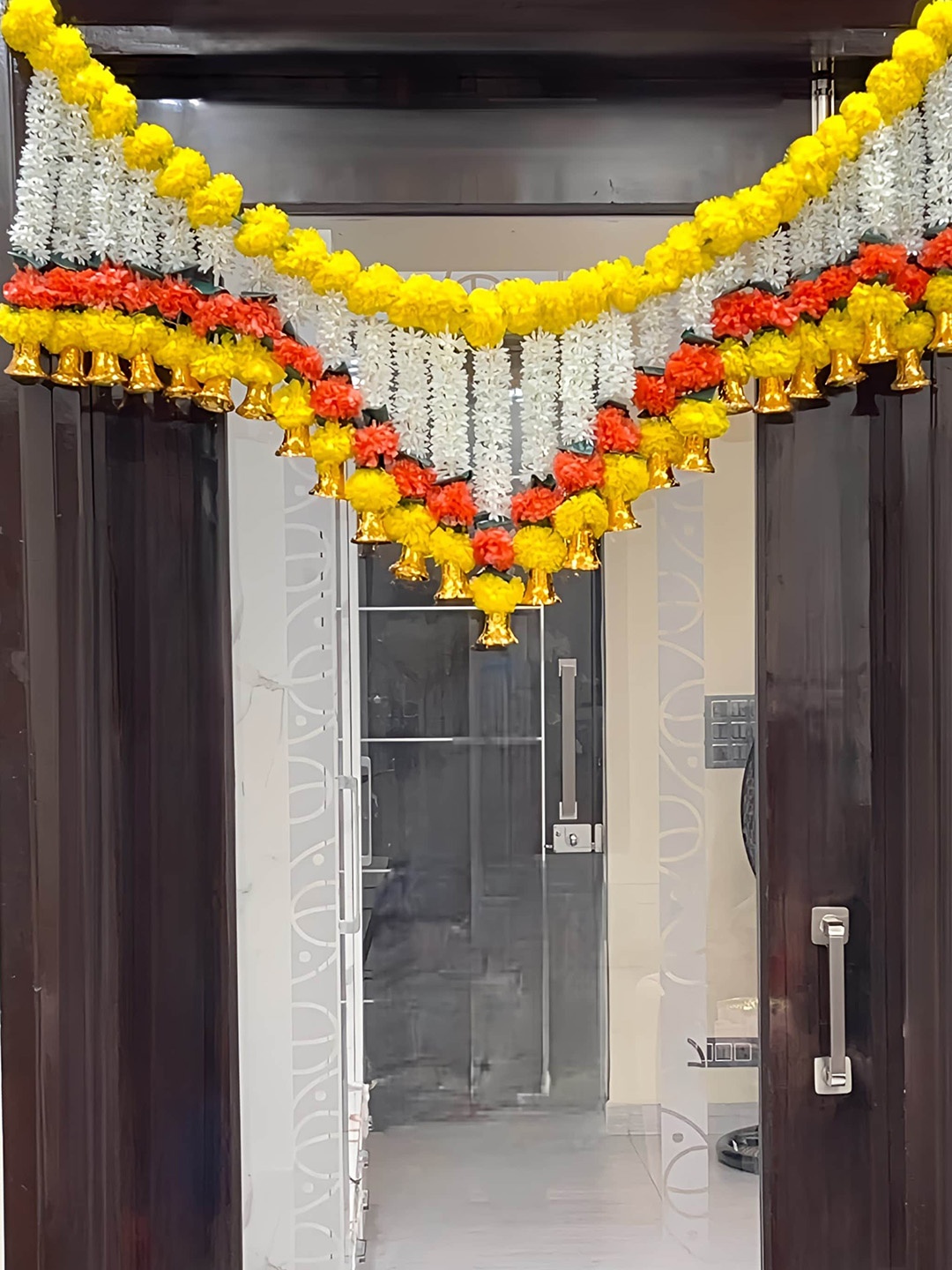 

Akaar Orange & Yellow Artificial Floral Hanging Toran