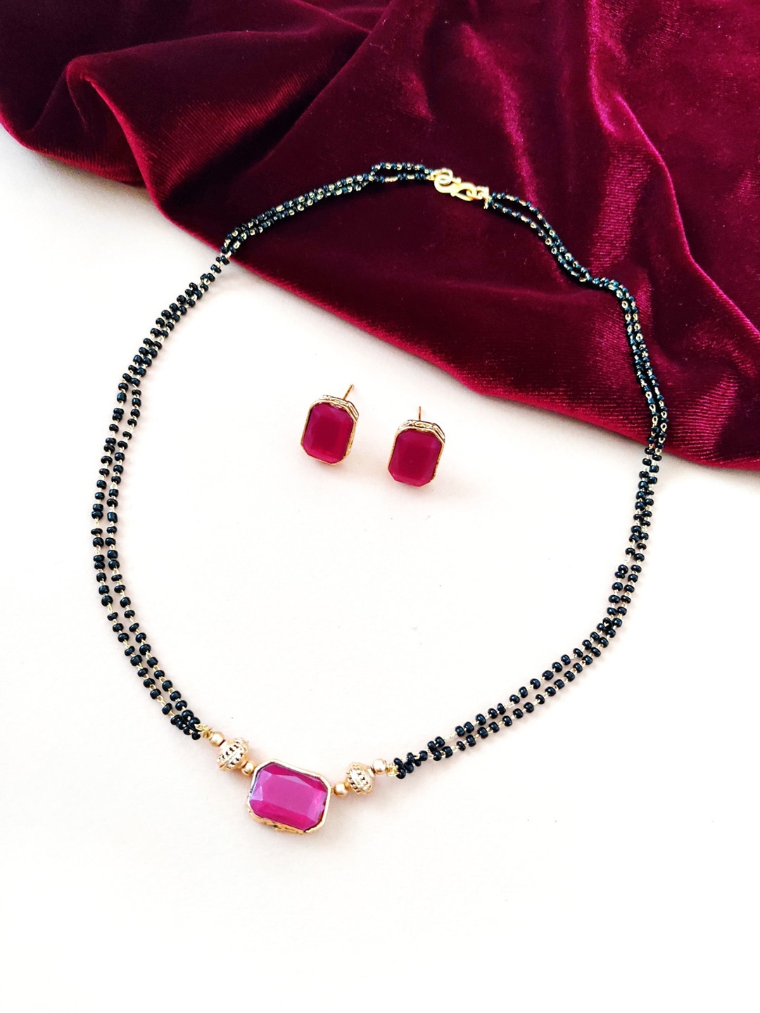 

Pihtara Jewels Gold Plated Beads Studded Jewellery Set