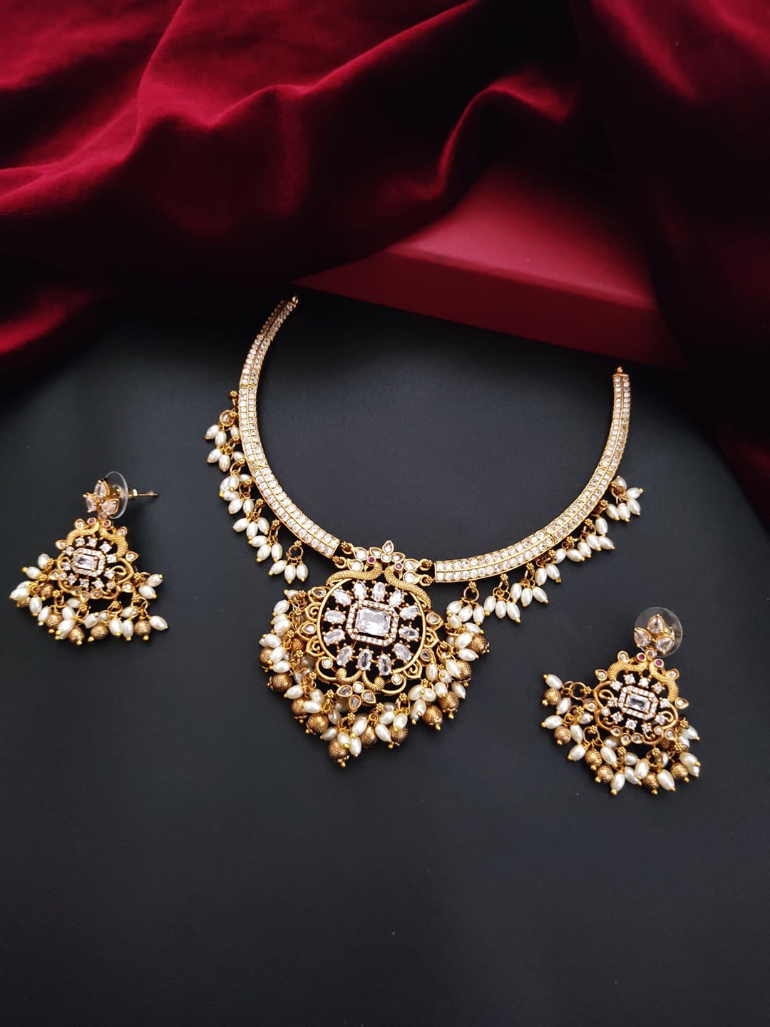 

Pihtara Jewels Gold Plated Stone Studded Hasli Jewellery Set