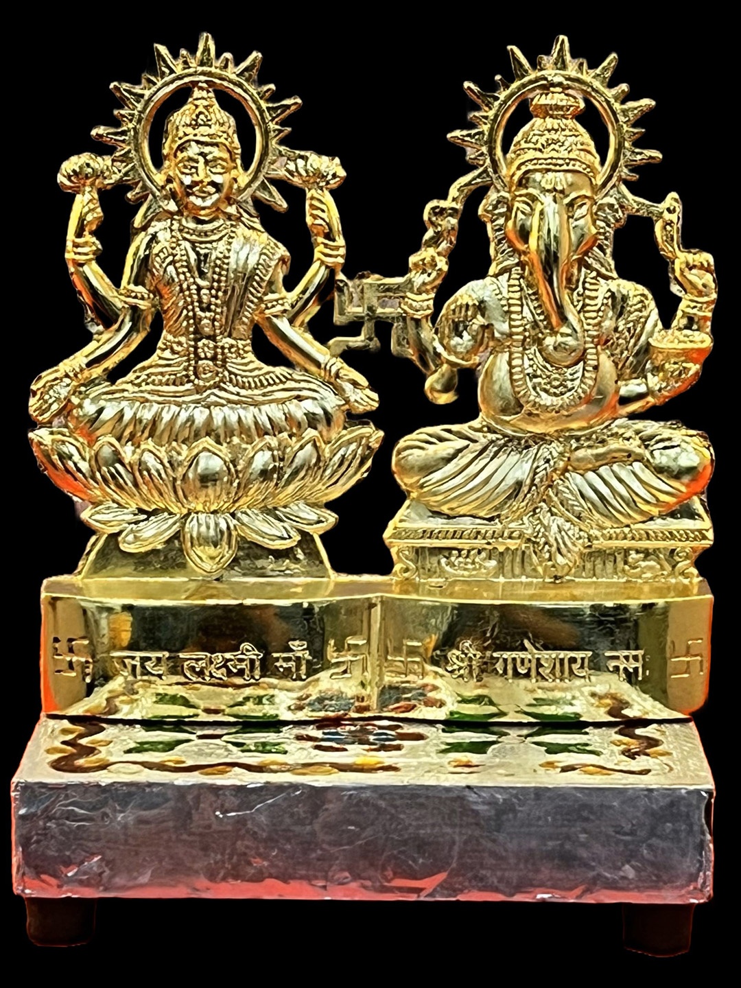 

Akaar Gold-Toned Textured Lord Ganesh & Goddess Lakshmi Showpiece