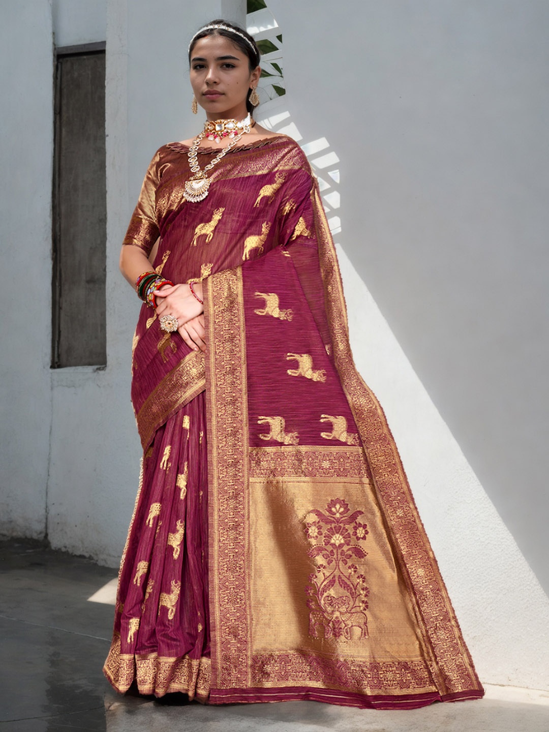 

Anouk Maroon Ethnic Motifs Woven Design Zari Saree