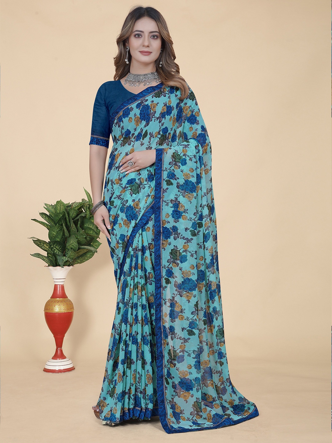 

KALINI Floral Printed Pure Georgette Saree, Blue