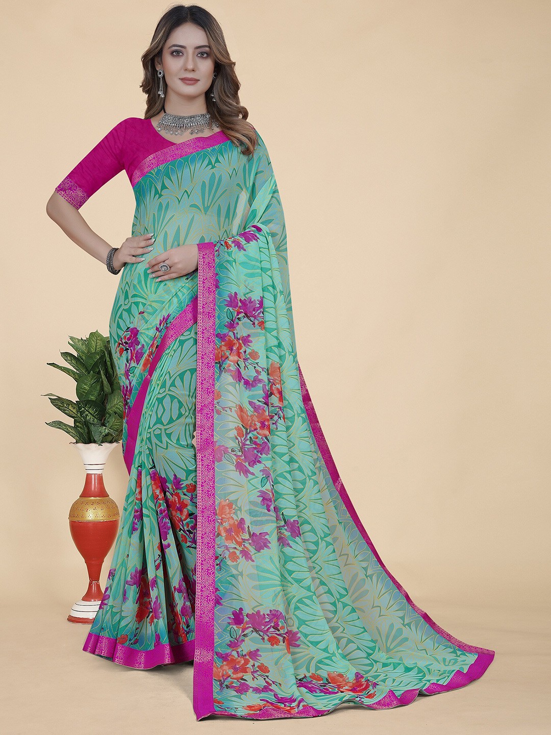 

KALINI Floral Zari Pure Georgette Saree, Blue
