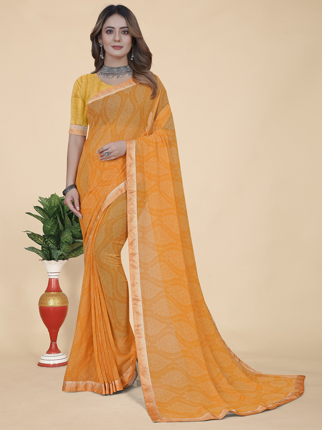 

KALINI Ethnic Motifs Printed Pure Georgette Saree, Orange