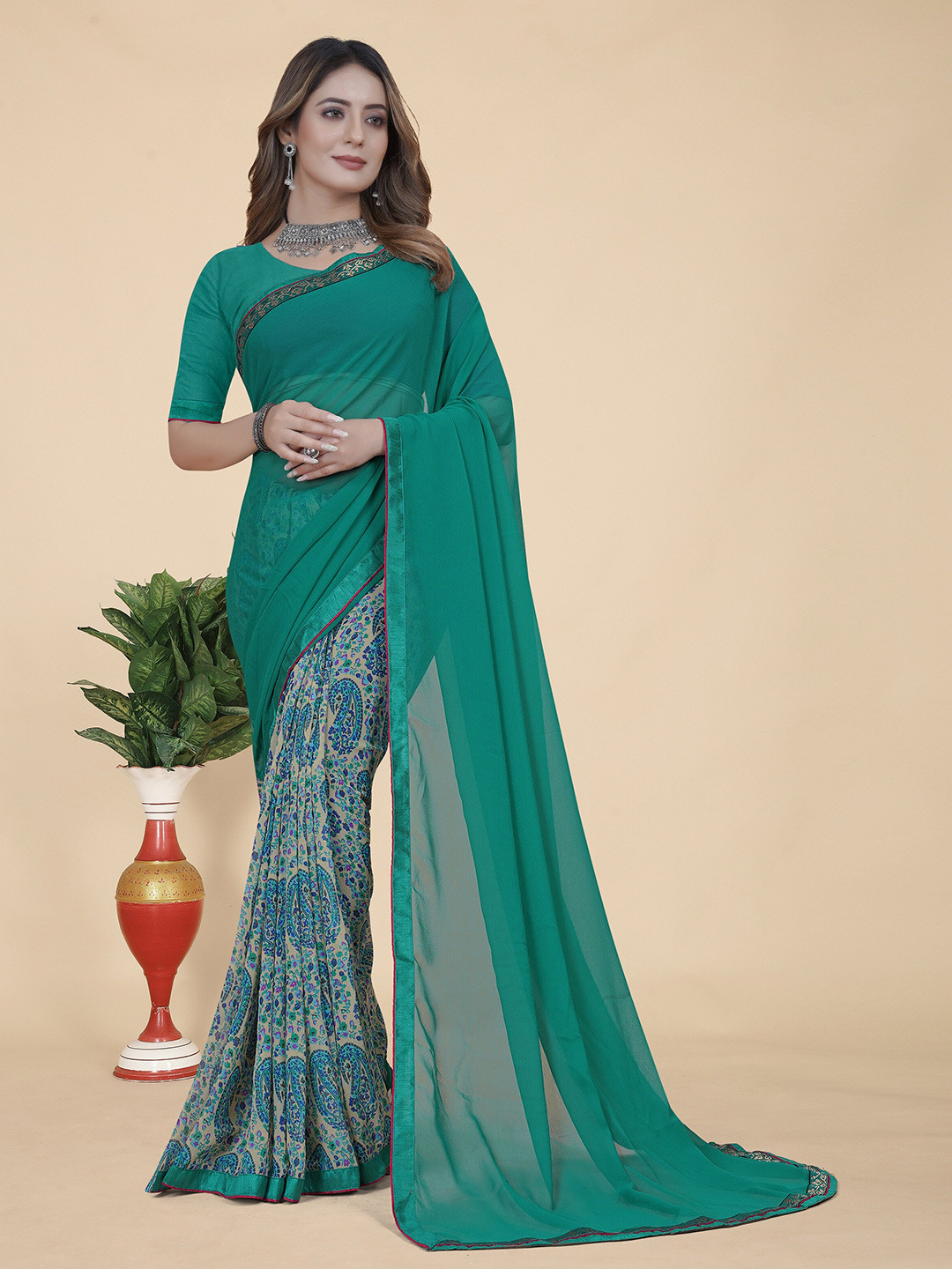 

KALINI Floral Pure Georgette Saree, Blue