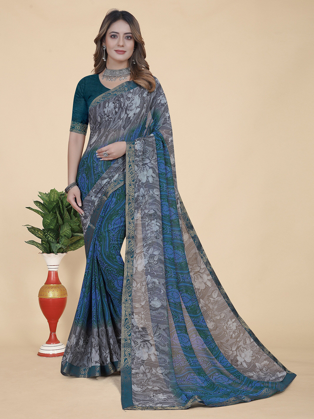 

KALINI Floral Printed Pure Georgette Saree, Blue