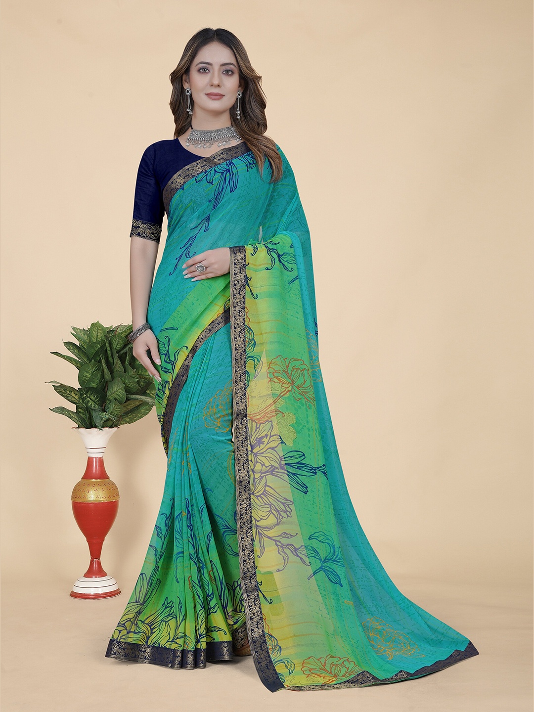 

KALINI Floral Printed Zari Pure Georgette Saree, Green
