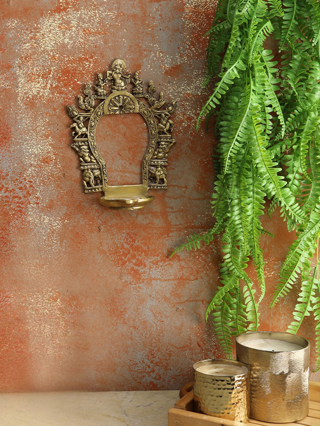 

Two Moustaches Gold-Toned Ethnic Carving Brass Prabhavali Frame With Diya