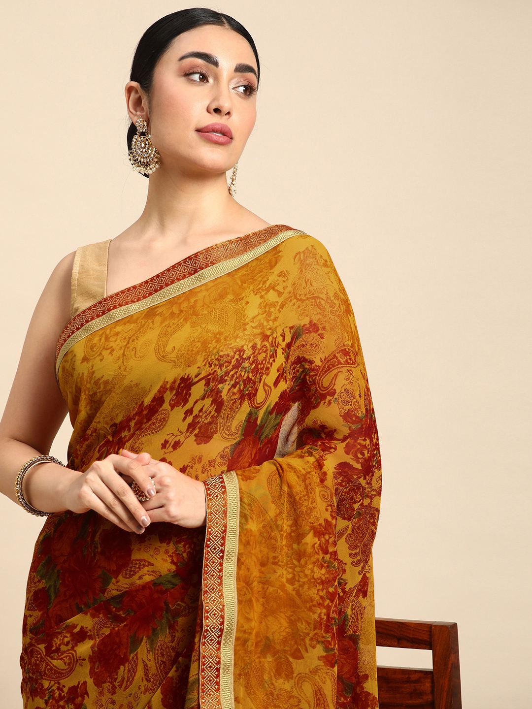 

HERE&NOW Ethnic Motifs Printed Zari Pure Georgette Saree, Yellow