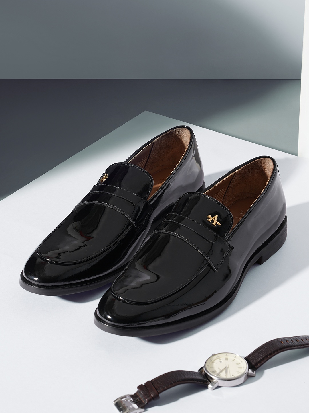 

Arrow Men Leather Formal Penny Loafers, Black