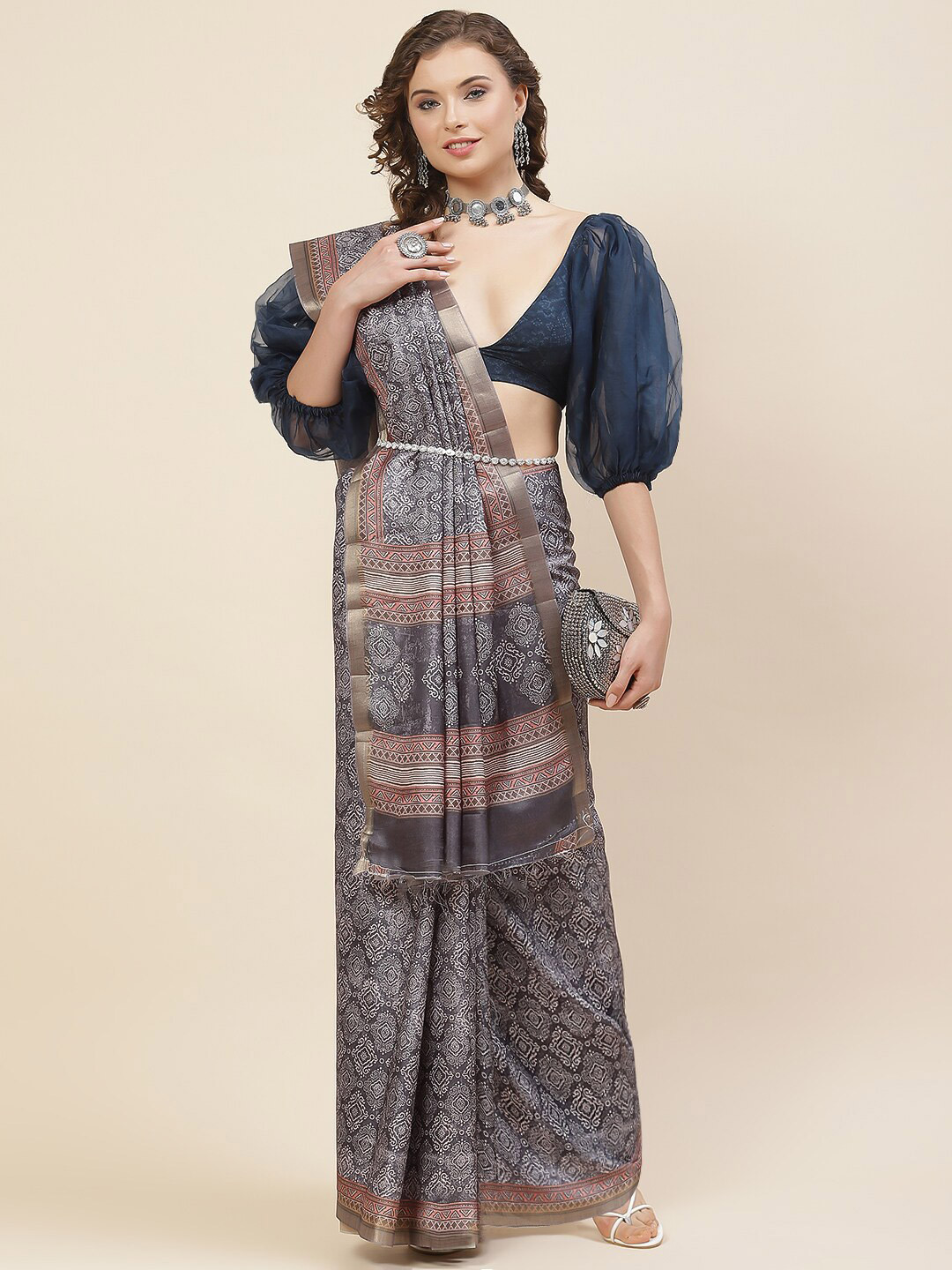 

Meena Bazaar Grey & White Ethnic Motifs Printed Zari Tussar Saree