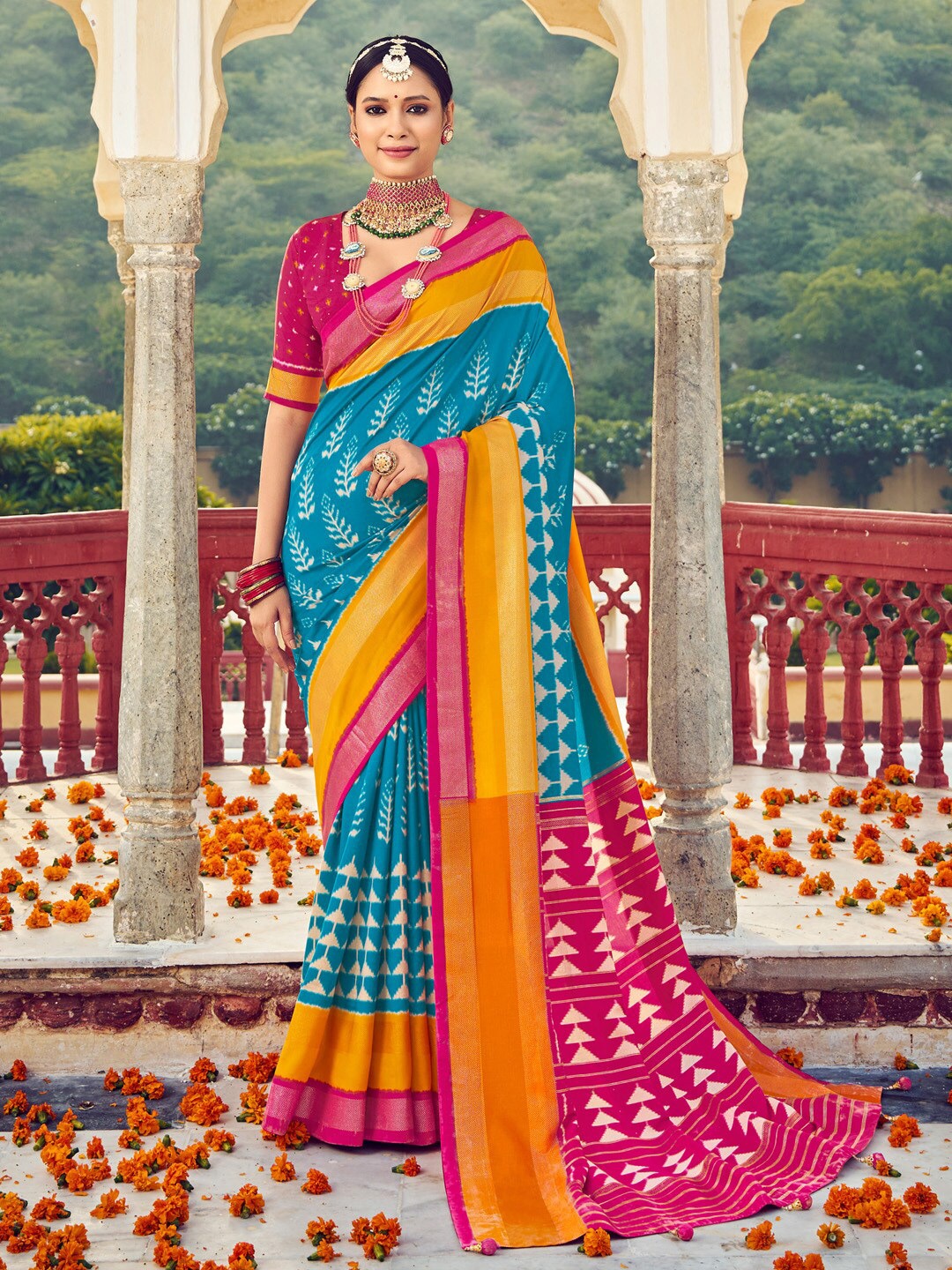 

Saree mall Floral Printed Zari Ikat Sarees, Blue